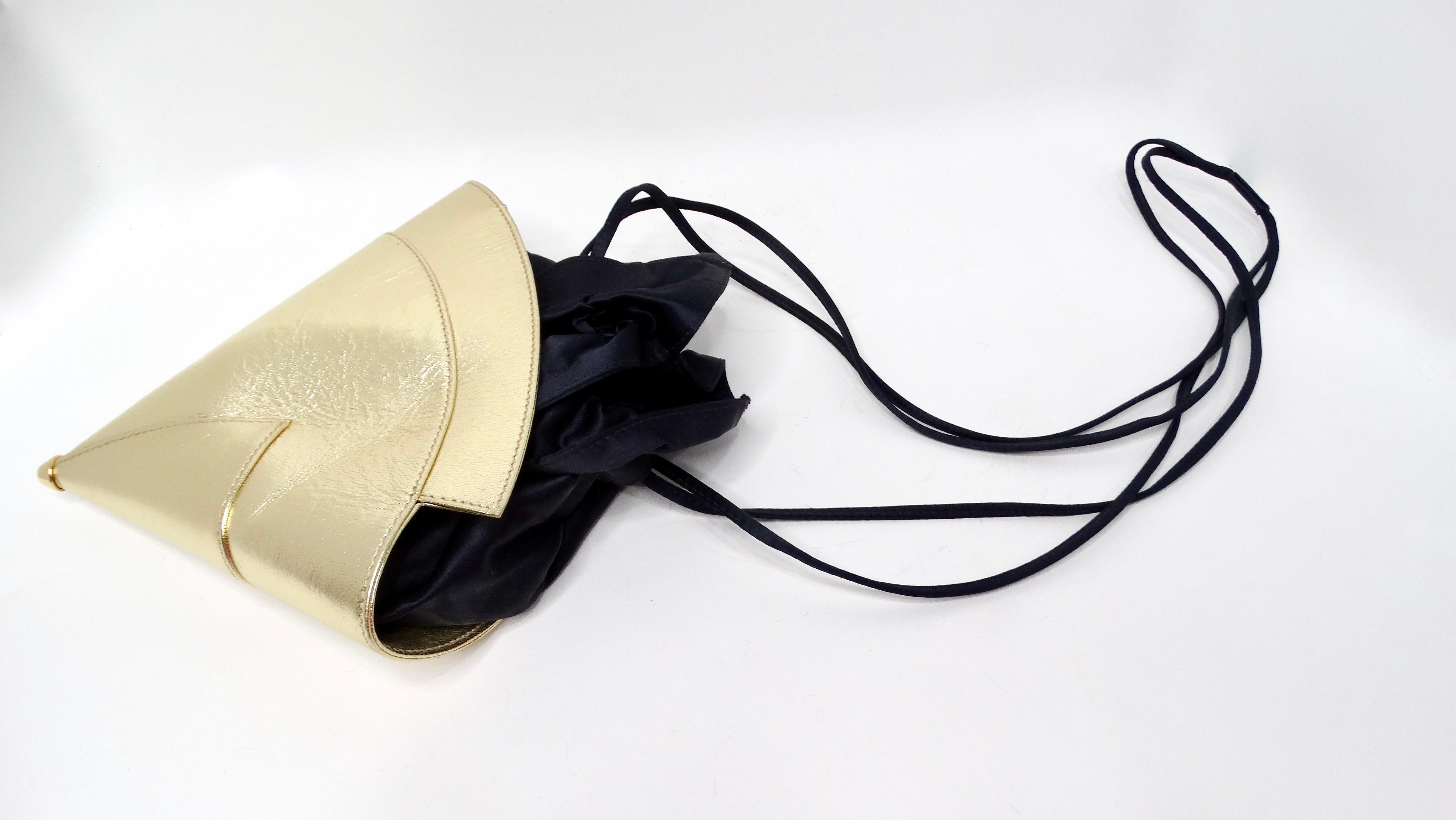 Elevate your evening ensemble with the Vintage Escada Gold Metallic Leather Cone Style Drawstring Evening Bag, a stunning accessory that exudes elegance and charm. This unique bag features a visually striking cone silhouette, crafted from luxurious