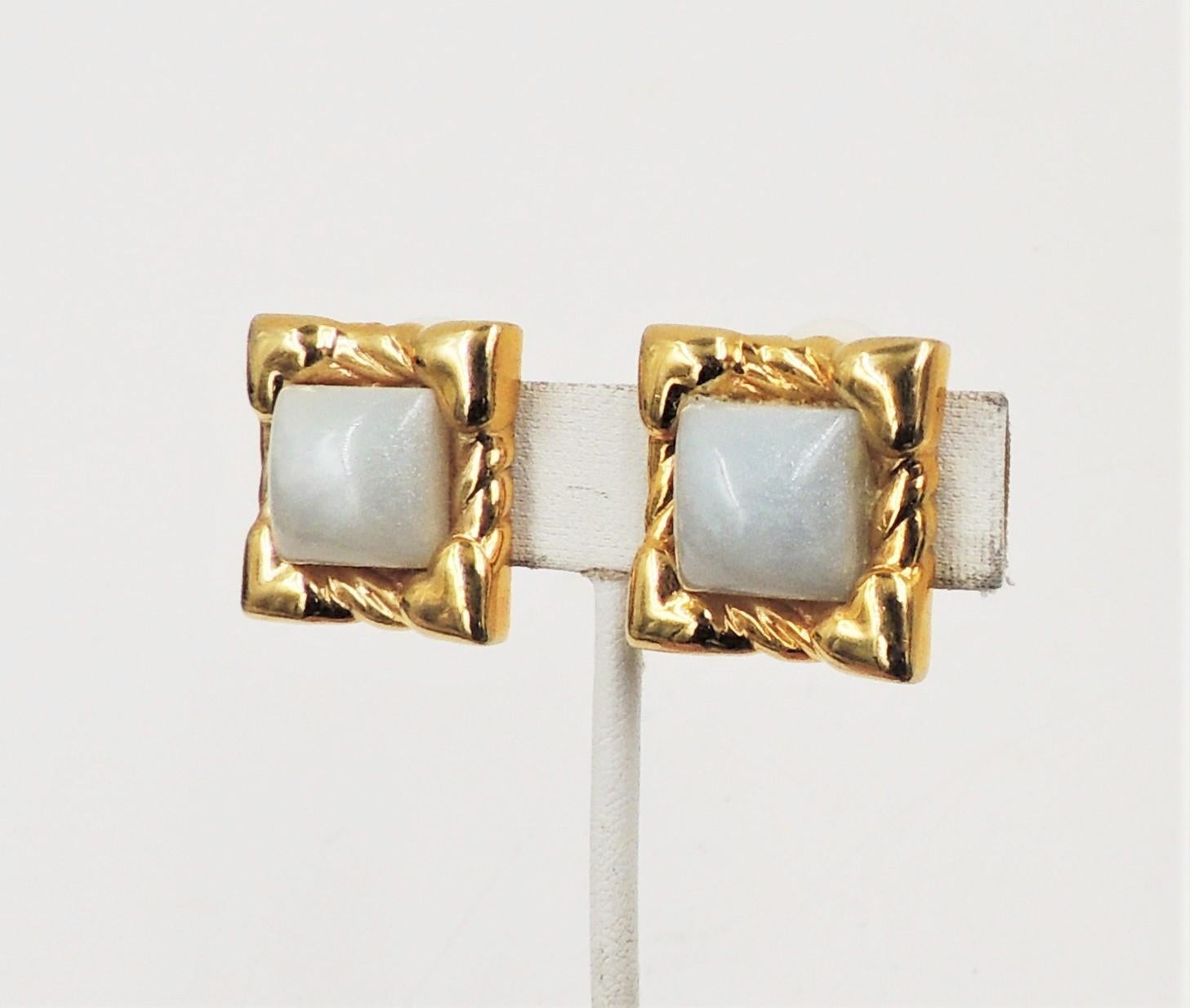 Vintage late 1980s or early 1990s square goldtone and white iridescent sugarloaf cabochon clip back earrings. Marked 