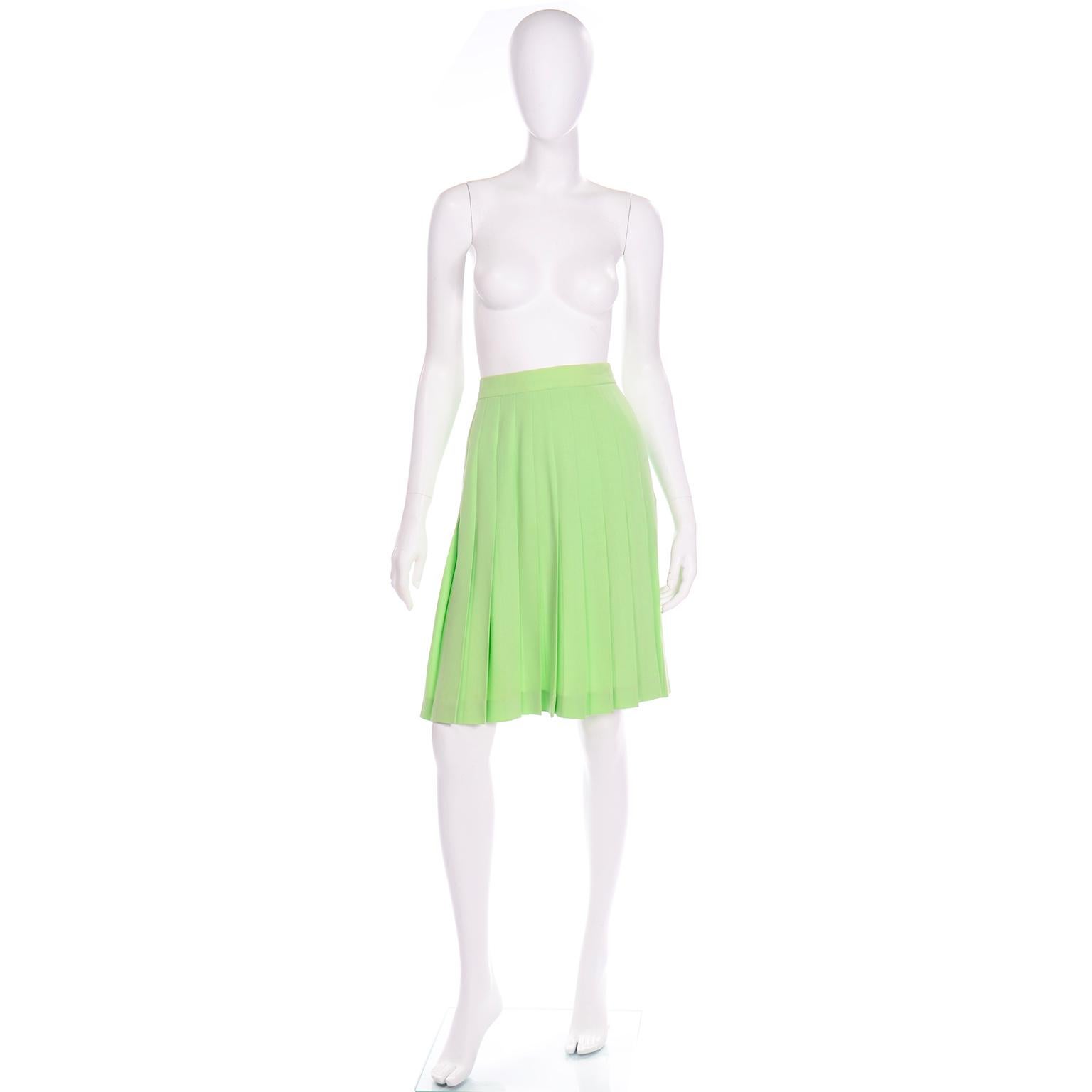 This lime green Summer weight wool Escada skirt would be a great addition to any wardrobe! This pastel lime green skirt is beautifully pleated and has two side slits.  The top of the hip measures 46