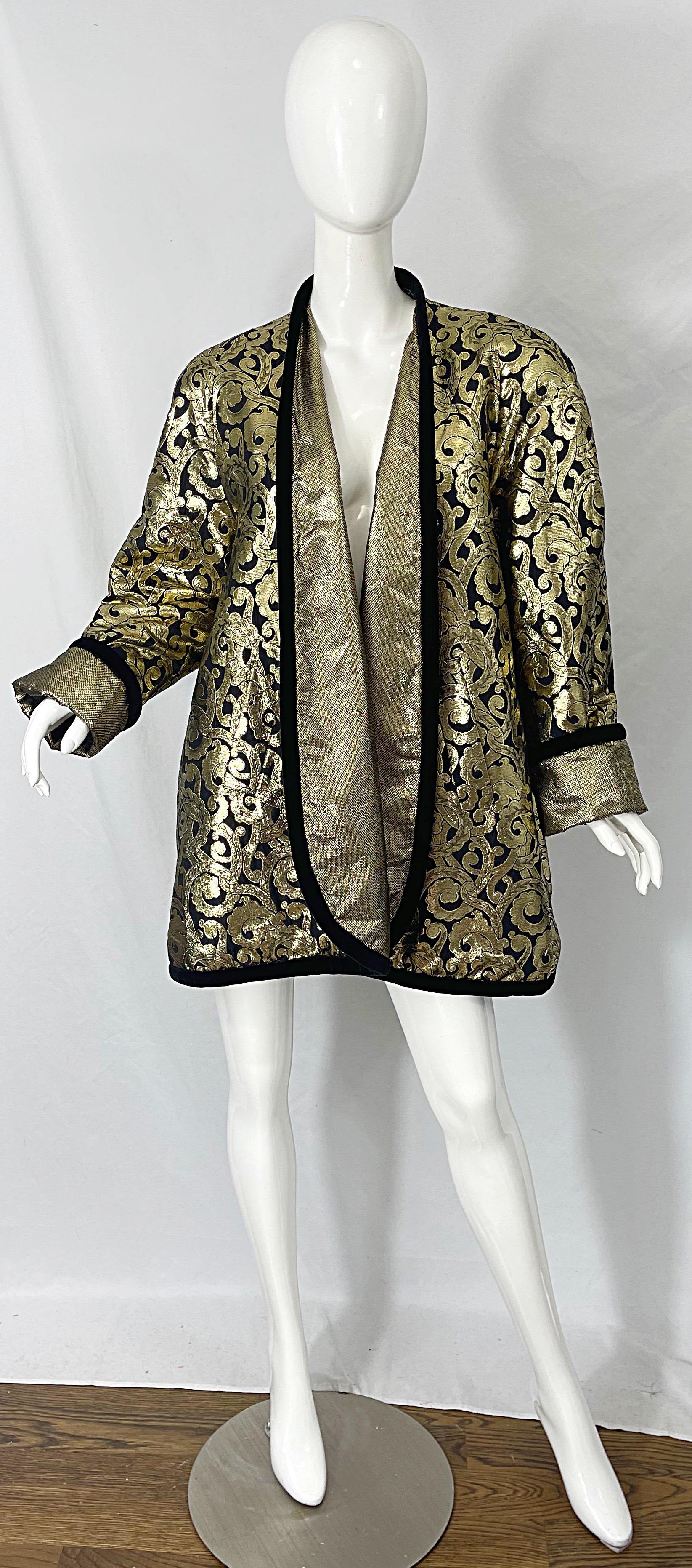 Fabulous late 80s ESCADA by MARGARETHA LEY metallic gold and black silk swing trapeze jacket ! Features a regal print throughout with black silk velvet trim. Can easily be dressed up or down. Pair with a dress for evening wear, or with jeans or