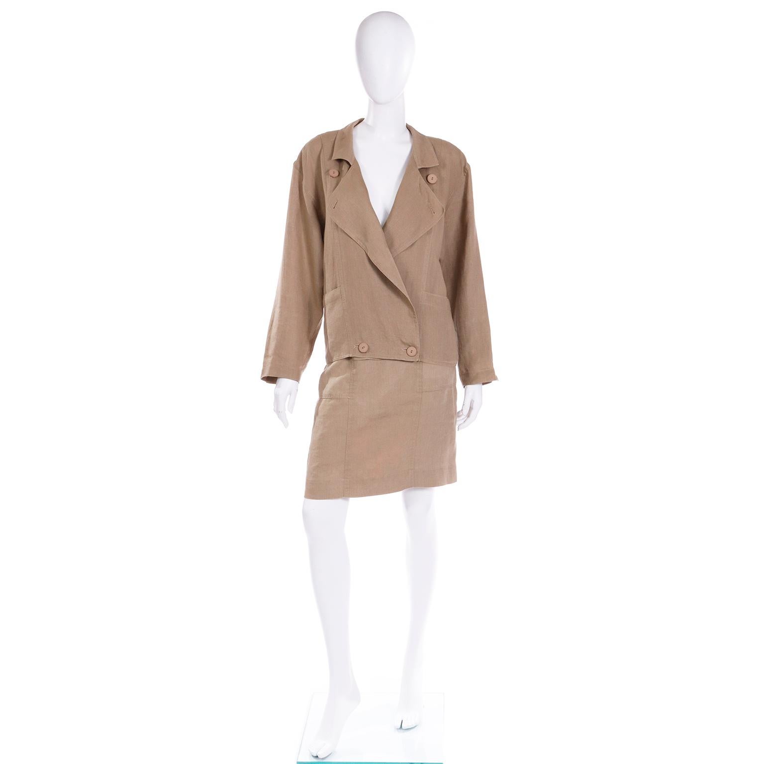 This 1980's vintage Escada Margaretha Ley khaki tan flax linen 2 piece suit includes a notched collar jacket and a pencil skirt.
The loose fitted, unlined jacket is labeled a size 36 and has hip patch pockets. This effortless jacket has long sleeves