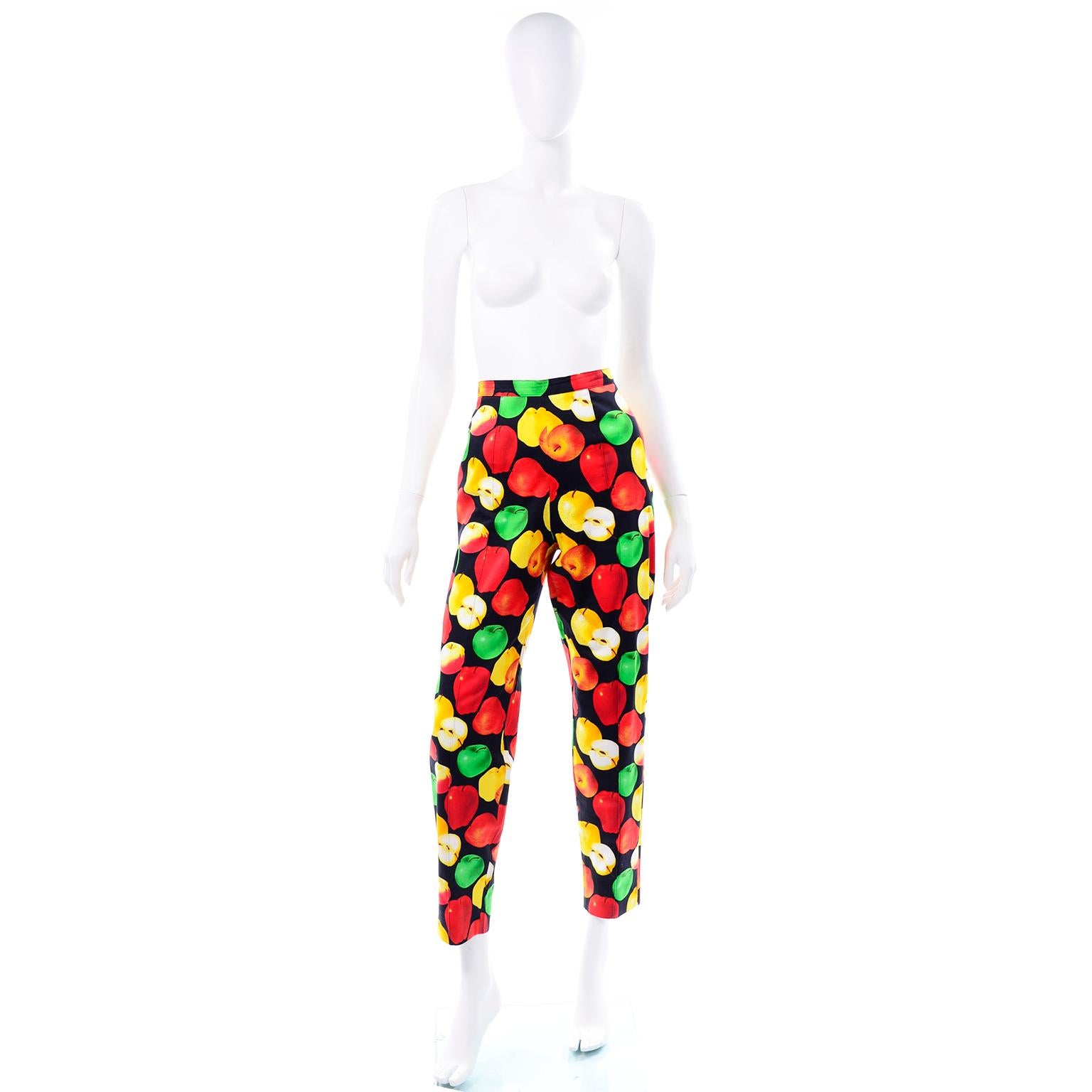 These vintage Escada Margaretha Ley pants are so unique and we love the vibrant colors of the variety of apples represented in the colorful print. These 100% cotton pants are black with bright green granny smith apples, red delicious, honeycrisps,