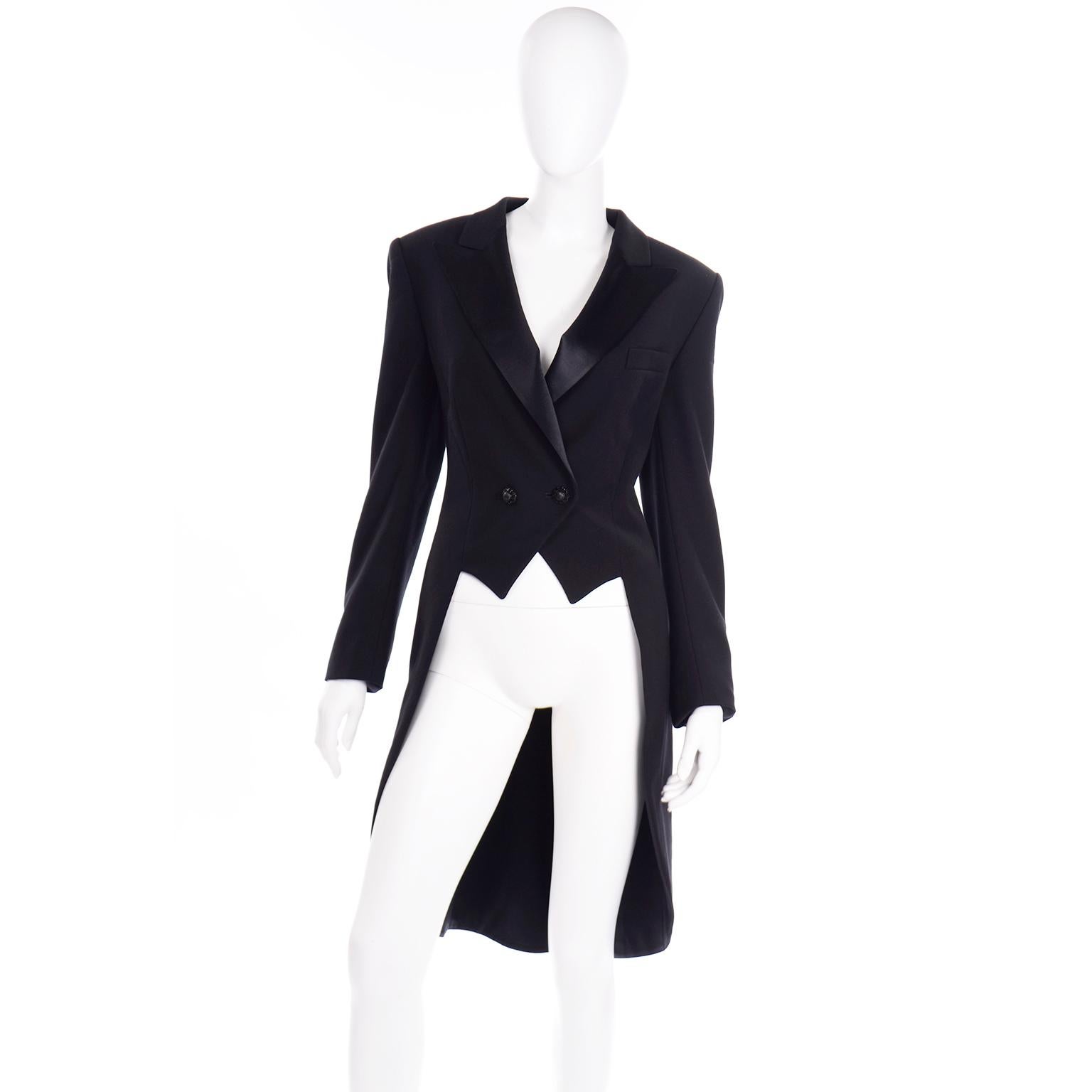 This vintage black wool cutaway tuxedo style Escada coat would make a perfect addition to any wardrobe and is just another reason to fall in love with Margaretha Ley Escada pieces. The pointed lapels of this double breasted blazer are in black silk