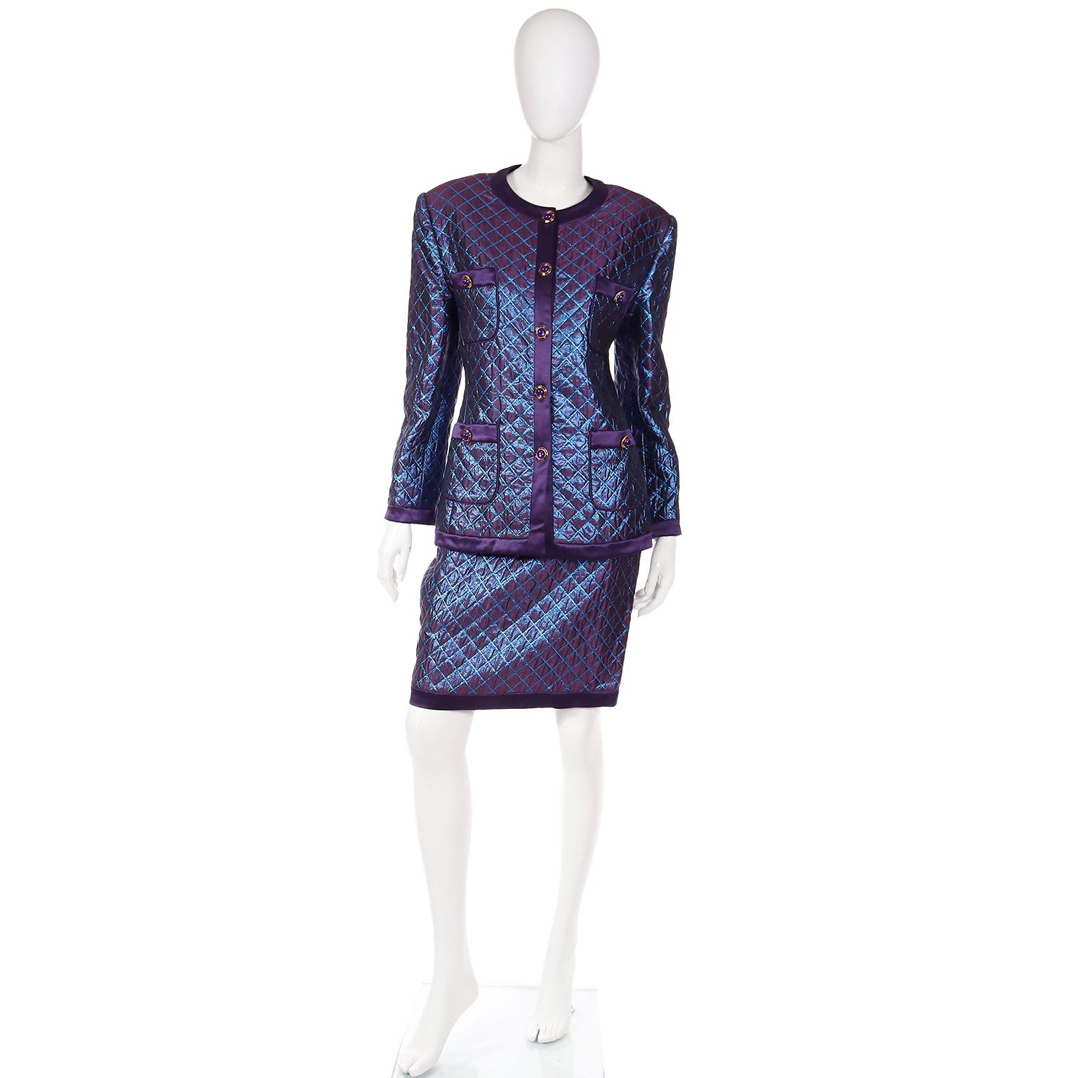 This is an outstanding Escada Margaretha Ley 1980's purple metallic 2 piece evening suit that includes a long jacket and a slim skirt. The purple quilted fabric has blue metallic thread that defines the diamond check pattern in the outfit. The