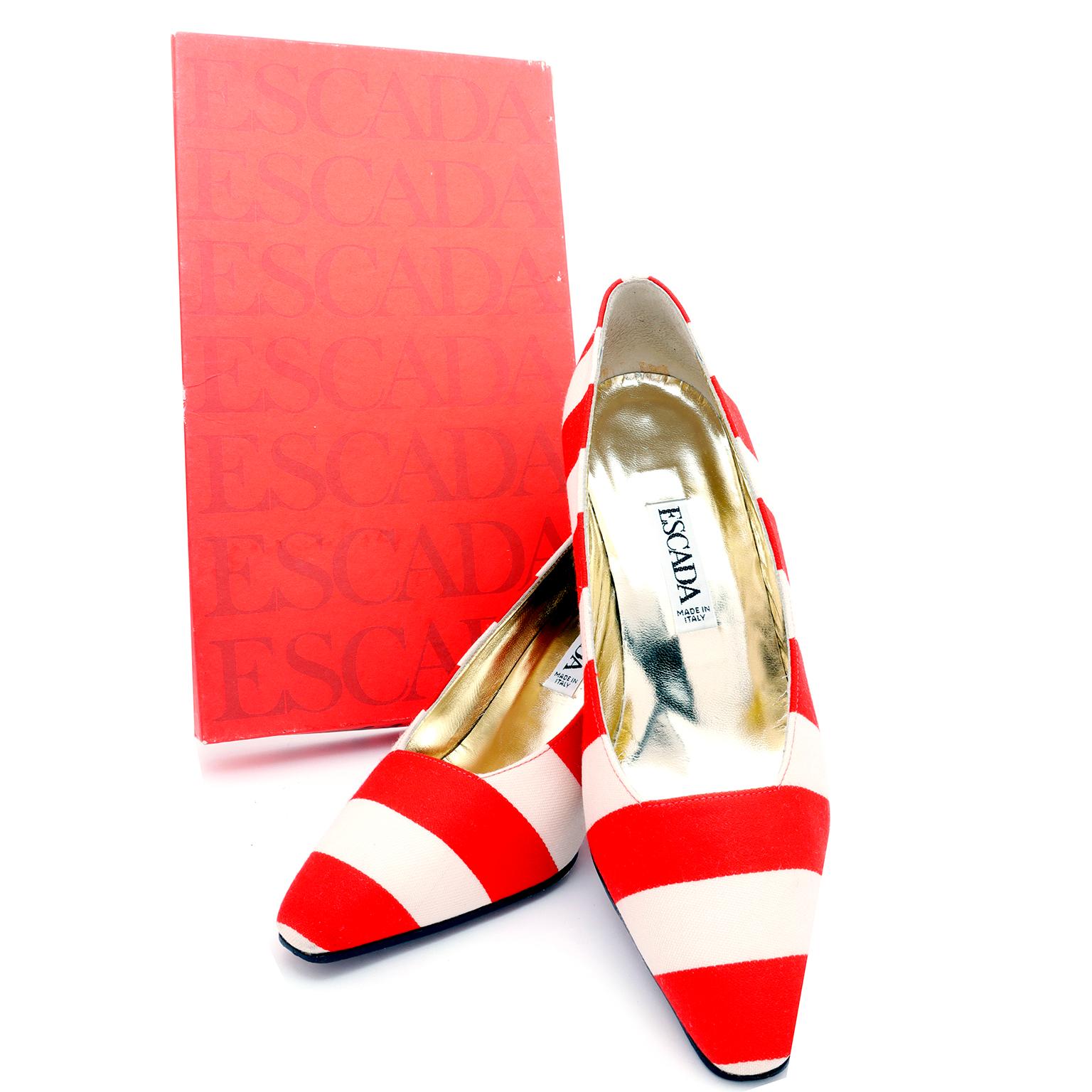 These are really fun vintage Escada Red and White striped pumps with black patent leather heels! The insoles are gold and the shoes are marked a size  7B. These come with their original box and were made in Italy in the late 1980's or early