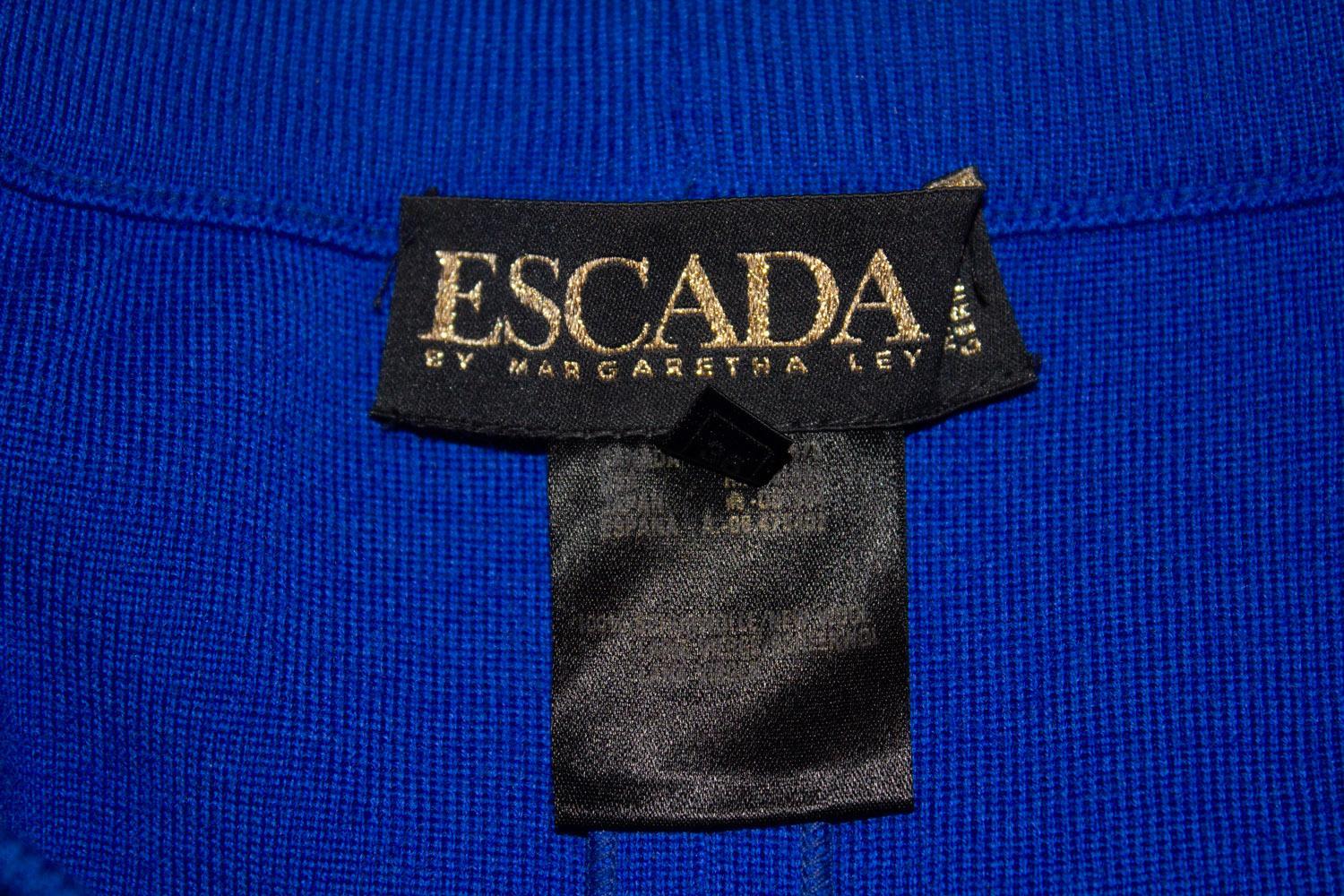 A fun vintage wool Skirt from Escada by Margaretha Ley. In a royal blue colour , the skirt has an elastic waist , flat front and  panels that swish as you walk. It is unlined.  Size 36 . Measurements: waist 28'', length 30''