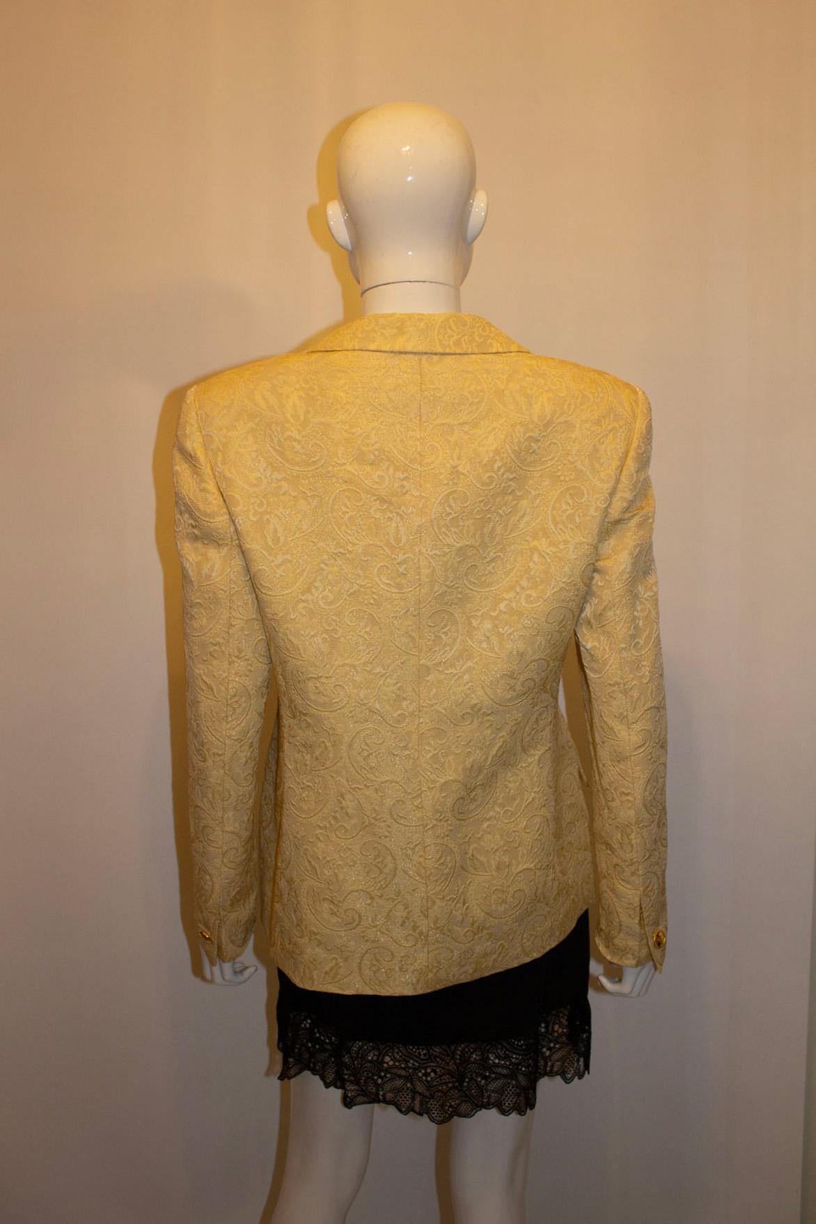 A super stylish vintage jacket from Escada. In a silk /wool mix , the jacket has a cut away collar , with three button front fastening and button on cuffs. It is  fully lined. 
Size 40 Measurements: Bust 38'', length 26''