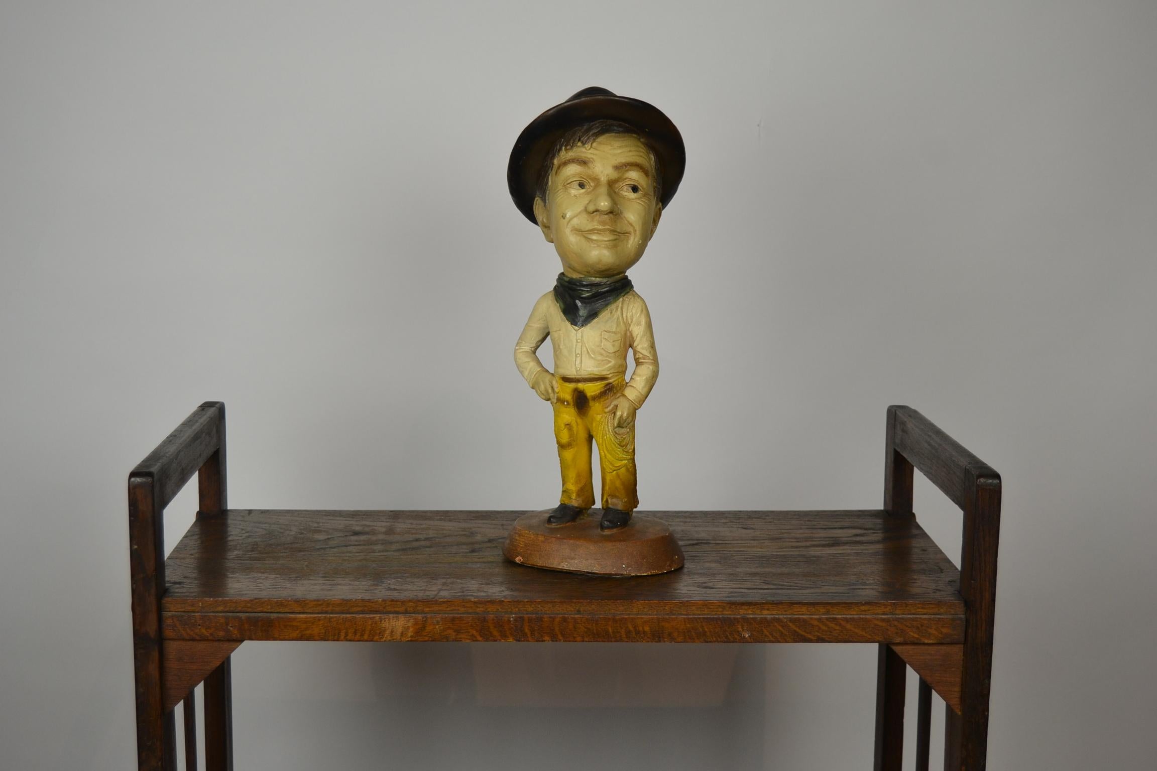 Vintage Esco statue of cowboy Will Rogers - Esco Prod. Inc. 1972.
This big - headed chalkware statue was made by Esco, 
the Entertainment Statue Company,
which is known for the big headed unauthorized caricature statuettes of famous people.
This
