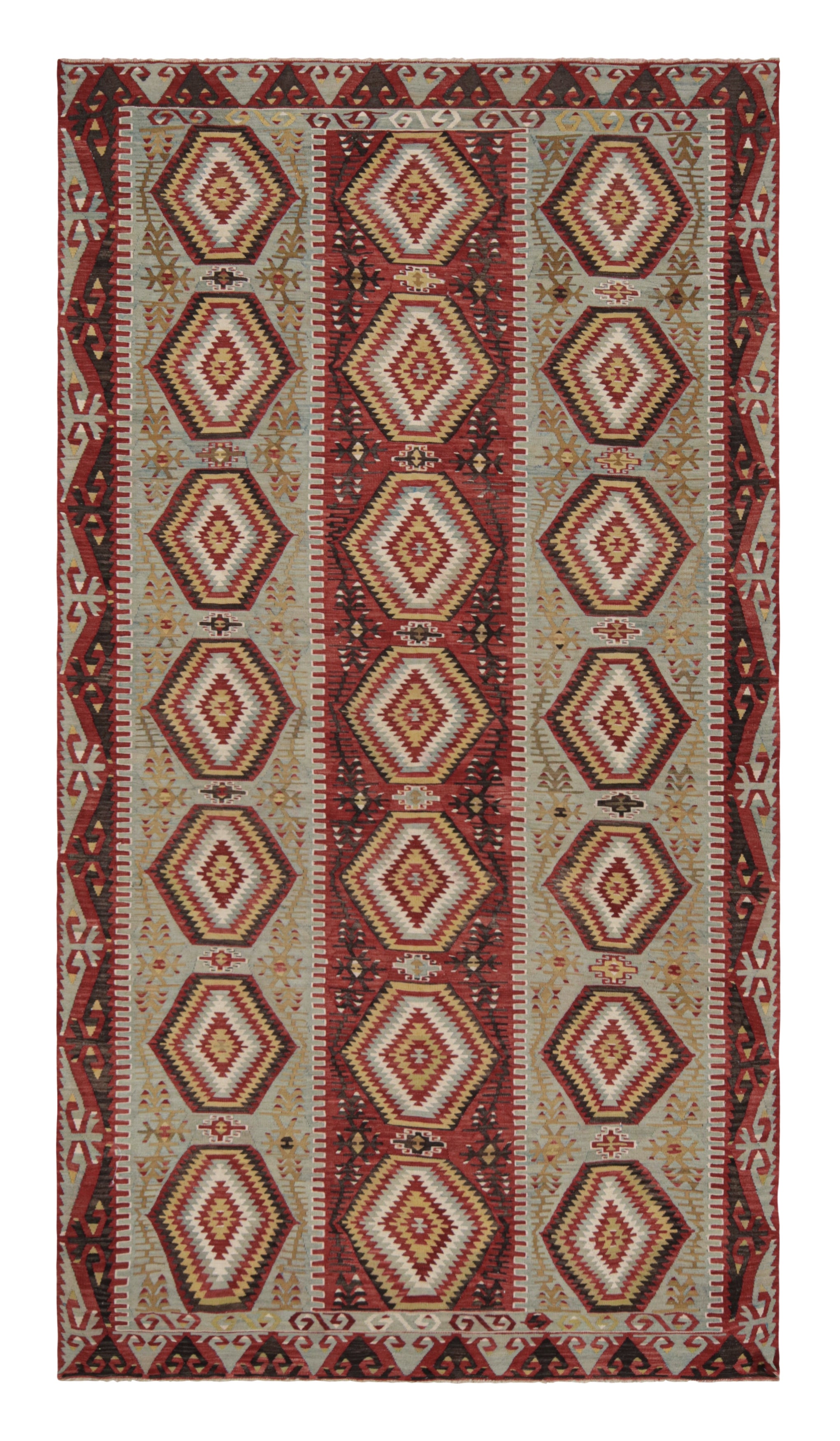 Teppich aus grüner und blauer Wolle mit lebhaften und erdfarbenen Akzenten von Rug & Kilim