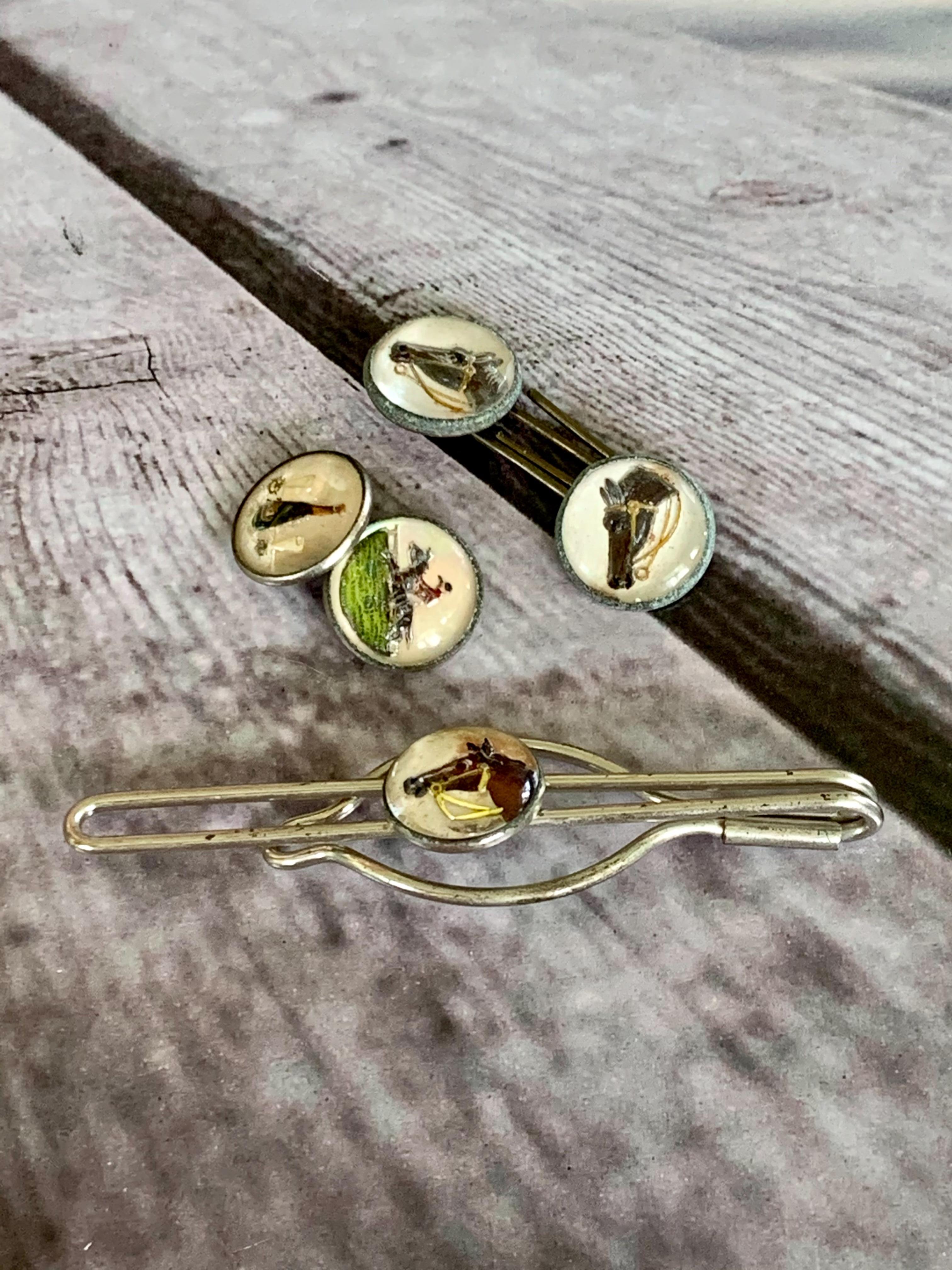 These classic vintage Silver Essex Crystal cufflink and tie clip components feature horses and celebratory scenes.  This is not a full set, but these pieces would be fantastic for repurposing or for spare parts.

No stamp

Face measures 1/2