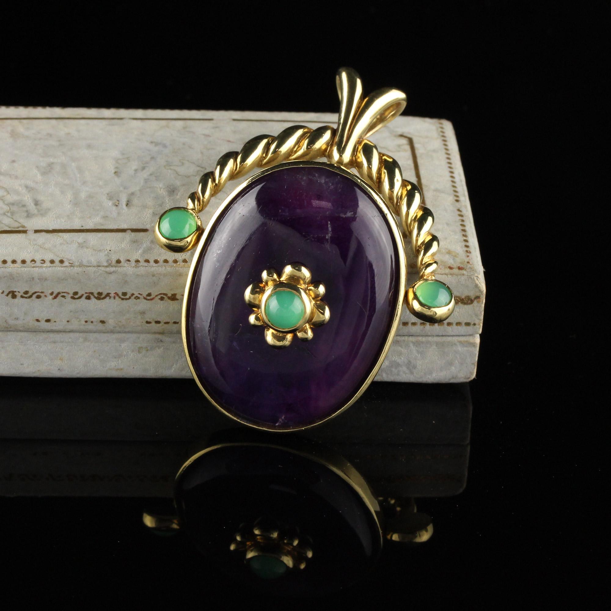 Bold and beautiful amethyst and chrysoprase pendant.

Metal: 14K/18K Yellow Gold

Weight: 38.9 Grams

Measurements: Pendant measures 2.48 x 1.81 inches. No chain included with pendant.