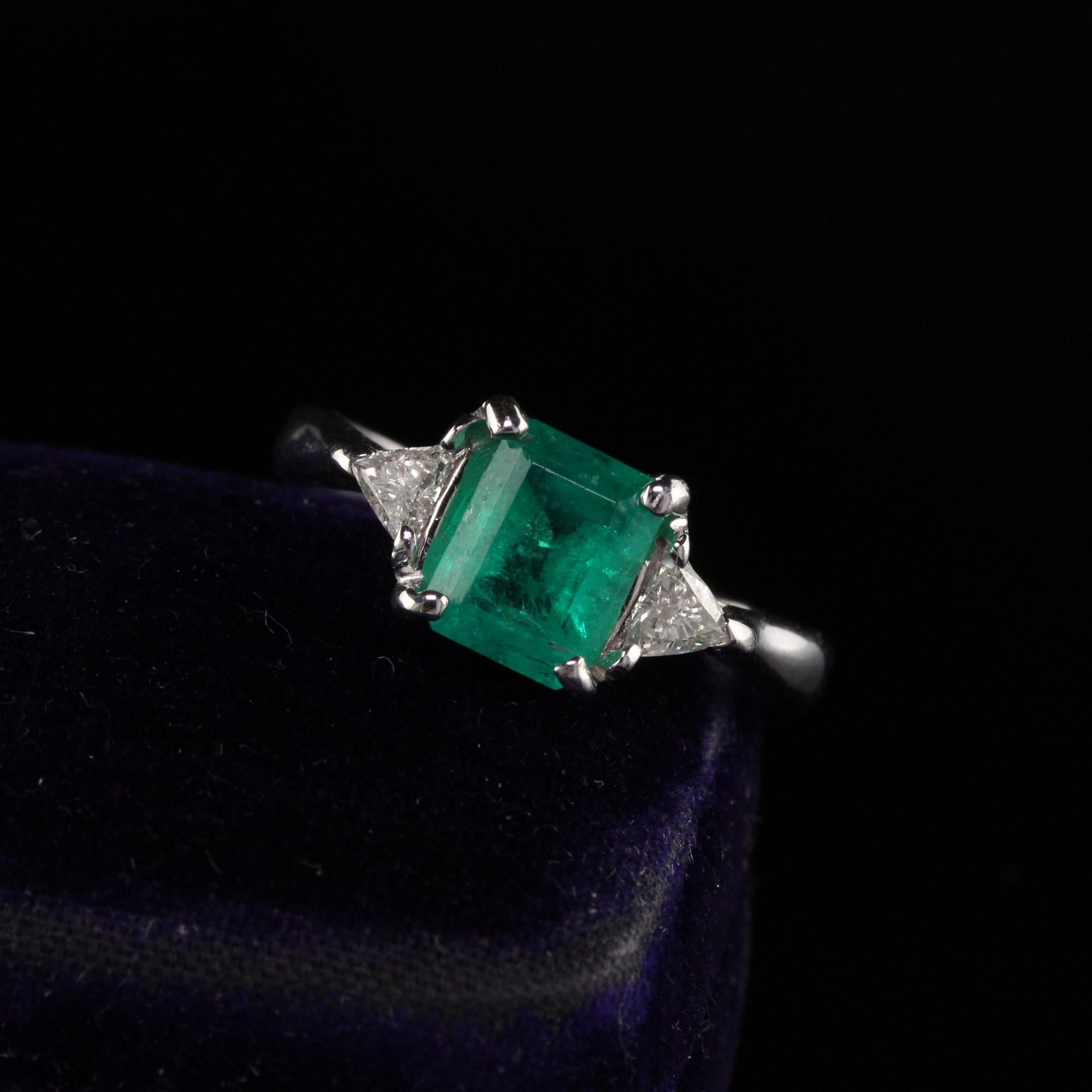Beautifully designed diamond ring with emerald center stone.

Metal: 14K White Gold

Weight: 4.1 Grams

Total Diamond Weight: Approximately 0.20 ct.

Diamond Color: H

Diamond Clarity: SI1

Gemstone Weight: Approximately 1 ct. emerald

Ring Size: