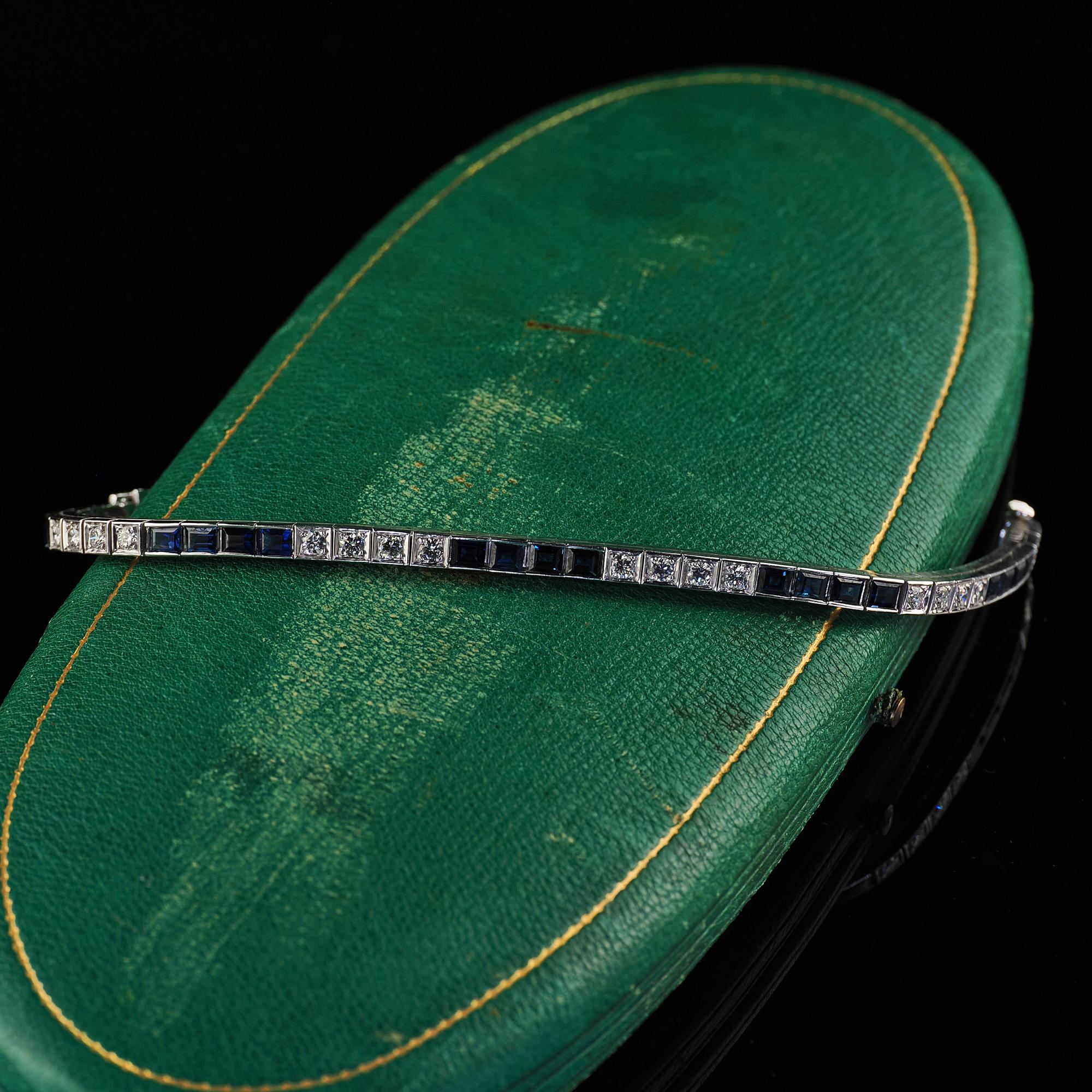 Beautiful Vintage Estate 14K White Gold Diamond and Sapphire Line Bracelet - 7 1/4 inches. This beautiful vintage estate diamond and sapphire line bracelet is crafted in 14k white gold. The bracelet features natural diamond and sapphires across the