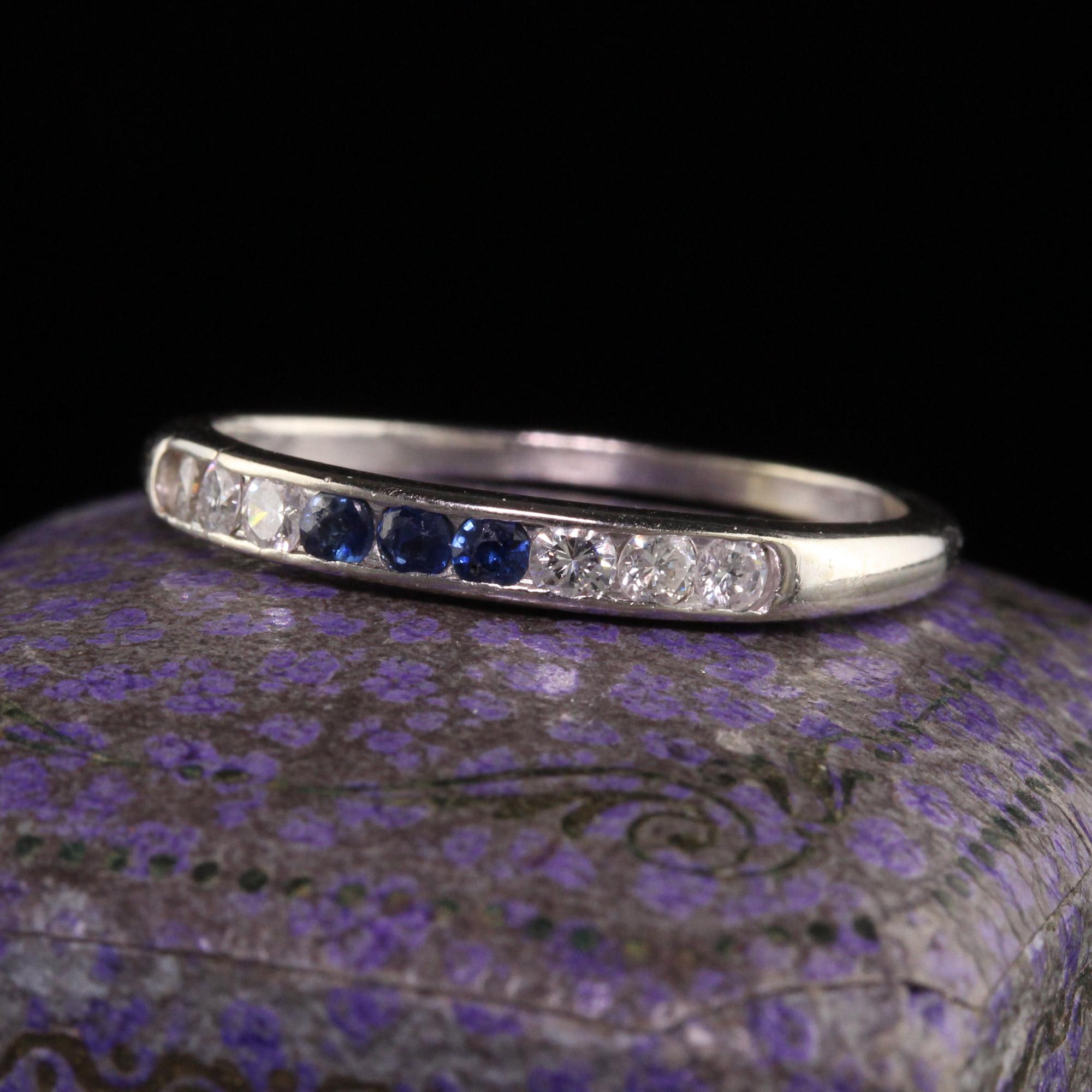 Beautiful Vintage Estate 14K White Gold Diamond and Sapphire Wedding Band - Size 8. This beautiful wedding band is crafted in 14k white gold. There are round cut diamonds and sapphire set on the top of the ring. It is in good condition.

Item