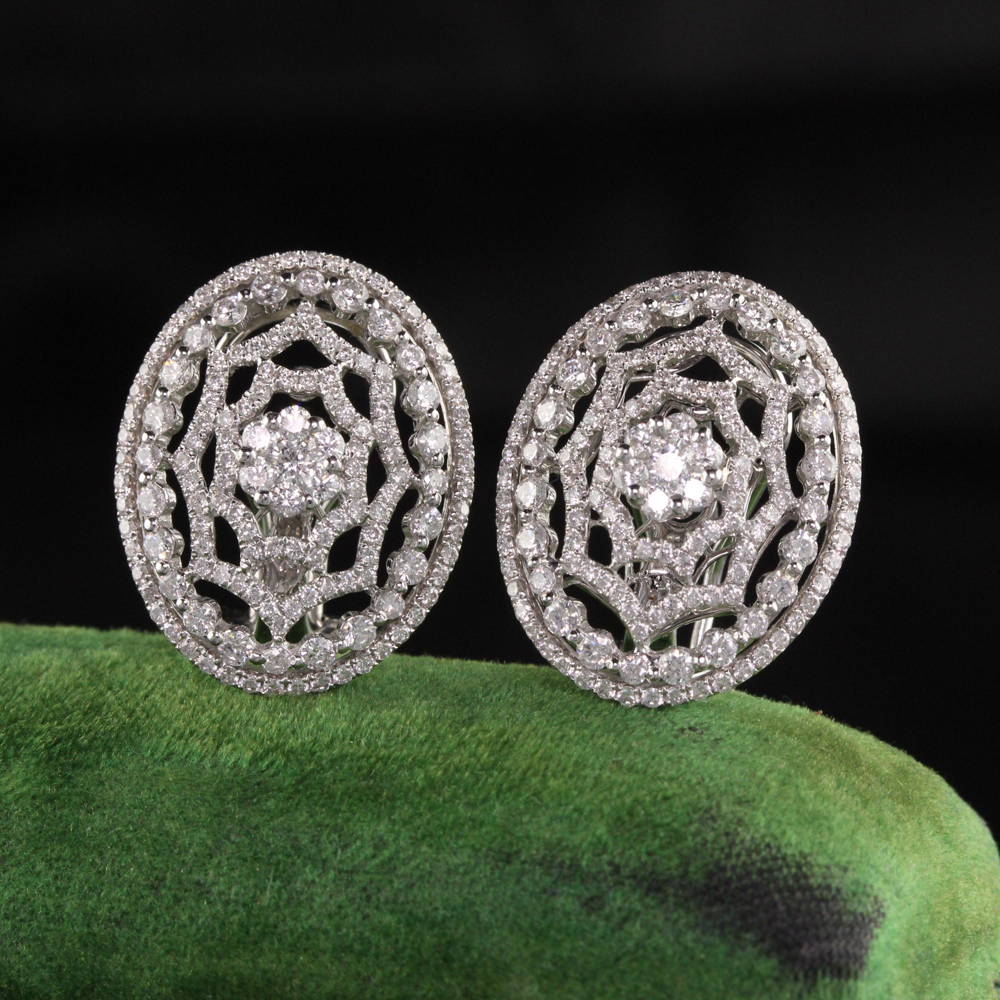 Dazzling diamond earrings with gorgeous design.

Metal: 14K White Gold

Weight: 7.3 Grams

Diamond Weight: Approximately 2 ct

Diamond Color: H

Diamond Clarity: SI1

Measurements: 0.87 x 0.69 inches