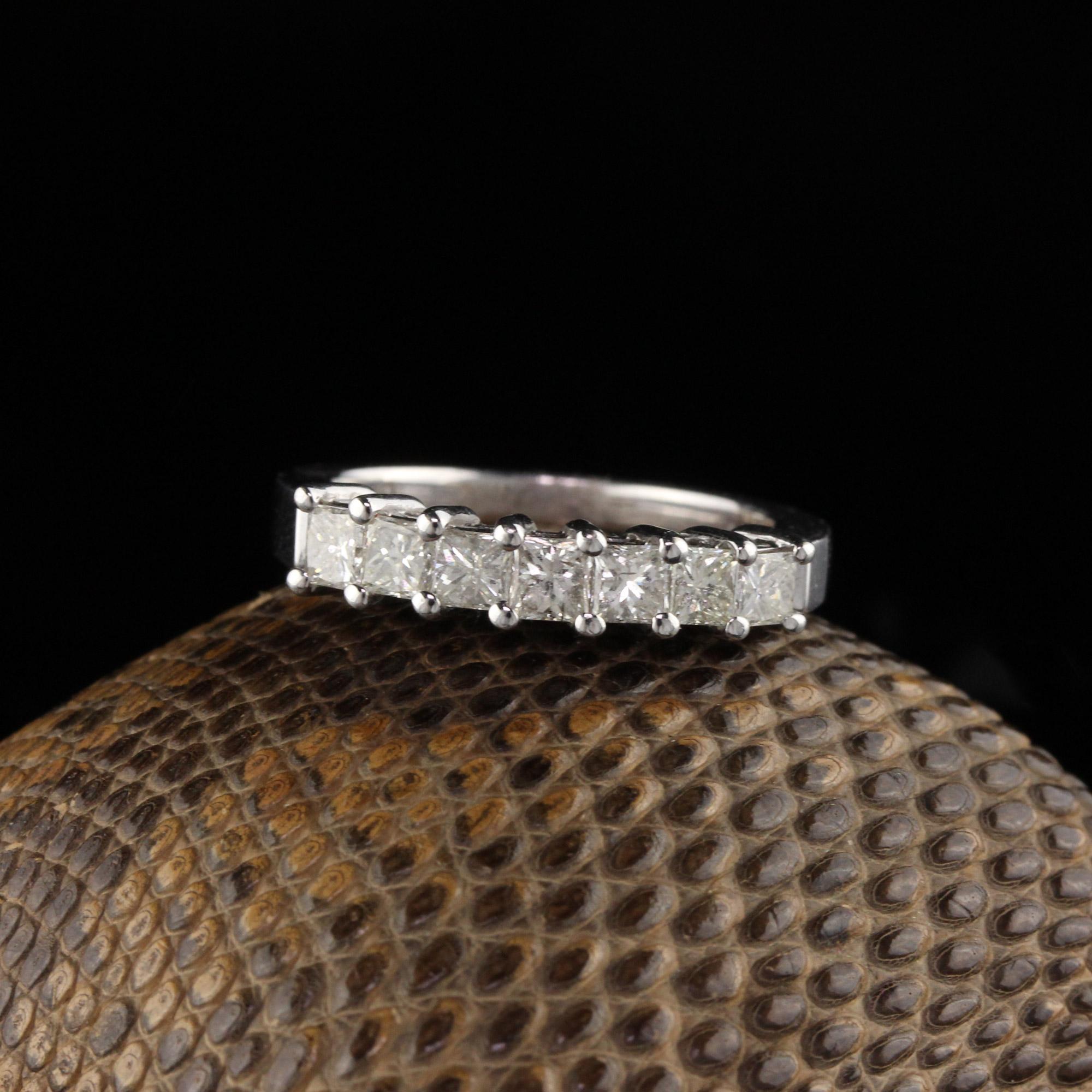 Elegant seven diamond band.

Metal: 14K White Gold

Weight: 4.0 Grams

Total Diamond Weight: Approximately 1.20 ct.

Diamond Color: H

Diamond Clarity: SI2

Ring Size: 6.25 (sizable)

Measurements: 4.30 x 4.87 mm
