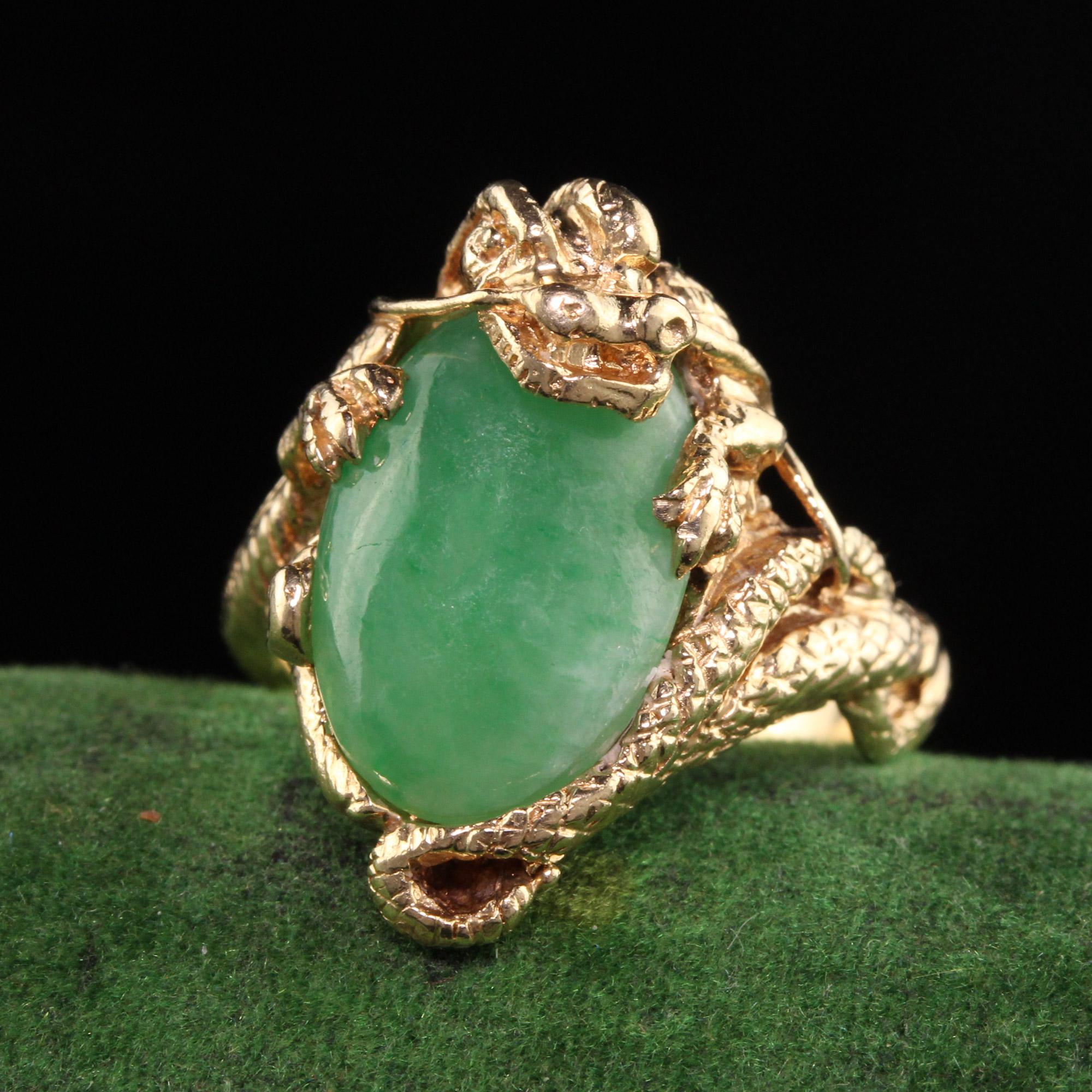 Beautiful Vintage Estate 14K Yellow Gold Cabochon Jade Dragon Ring. This beautiful vintage dragon ring features a cabochon jade in the center.

Item #R1067

Metal: 14K Yellow Gold

Weight: 9 Grams

Size: 6 1/2

Jade: Approximately 5