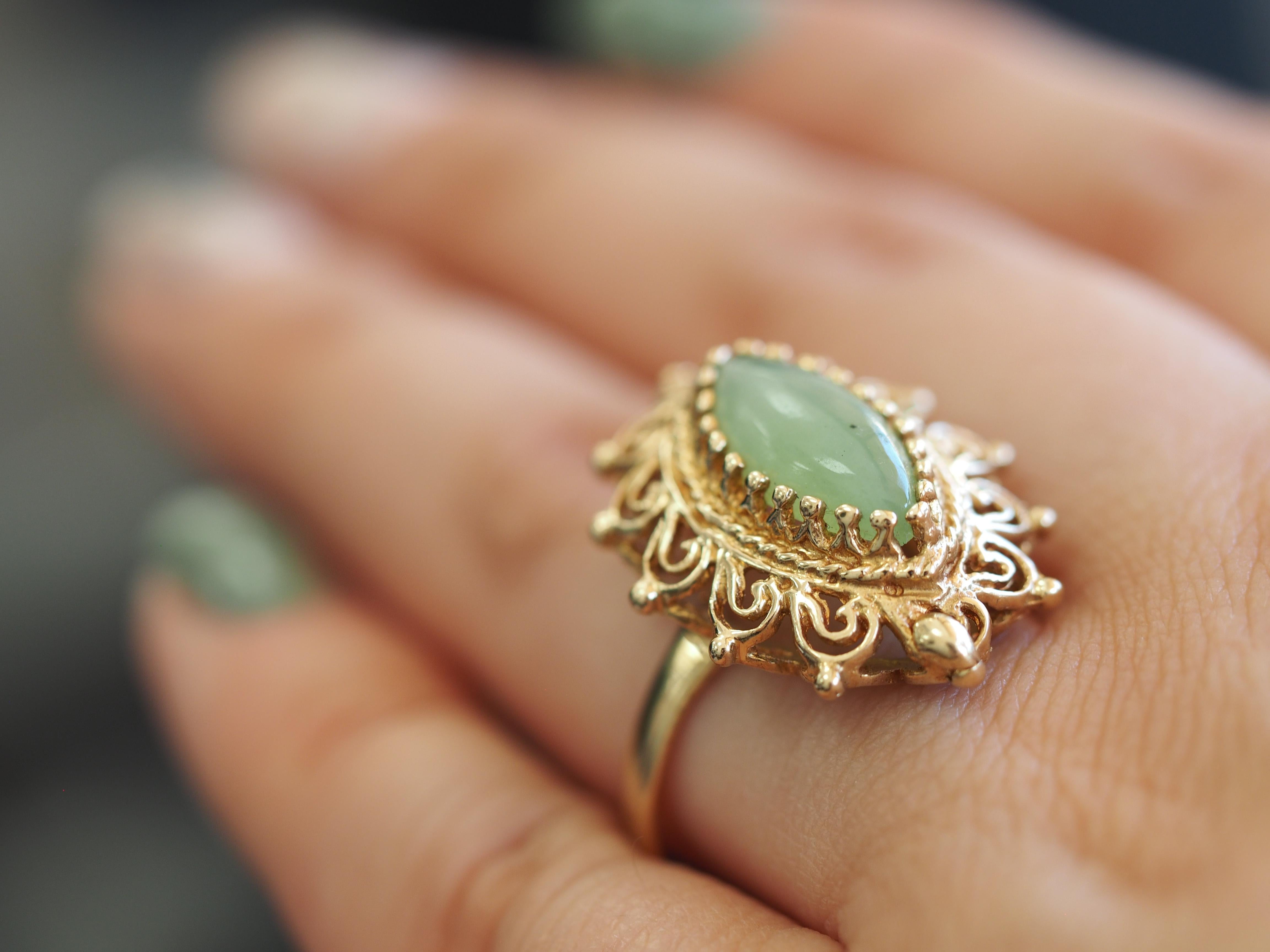 Estate 14K Yellow Gold Cabochon Jadeite Jade Ring. 
Finger size 8.5, this ring is sizable.

Ring Details 
Metal:  14 Karat Yellow Gold 
Weight:  5.2 Grams
Stamped: PS 14K

Center Stone Details
Stone: Jadeite Jade
Shape: Cabochon
Dimensions: 15.3 and