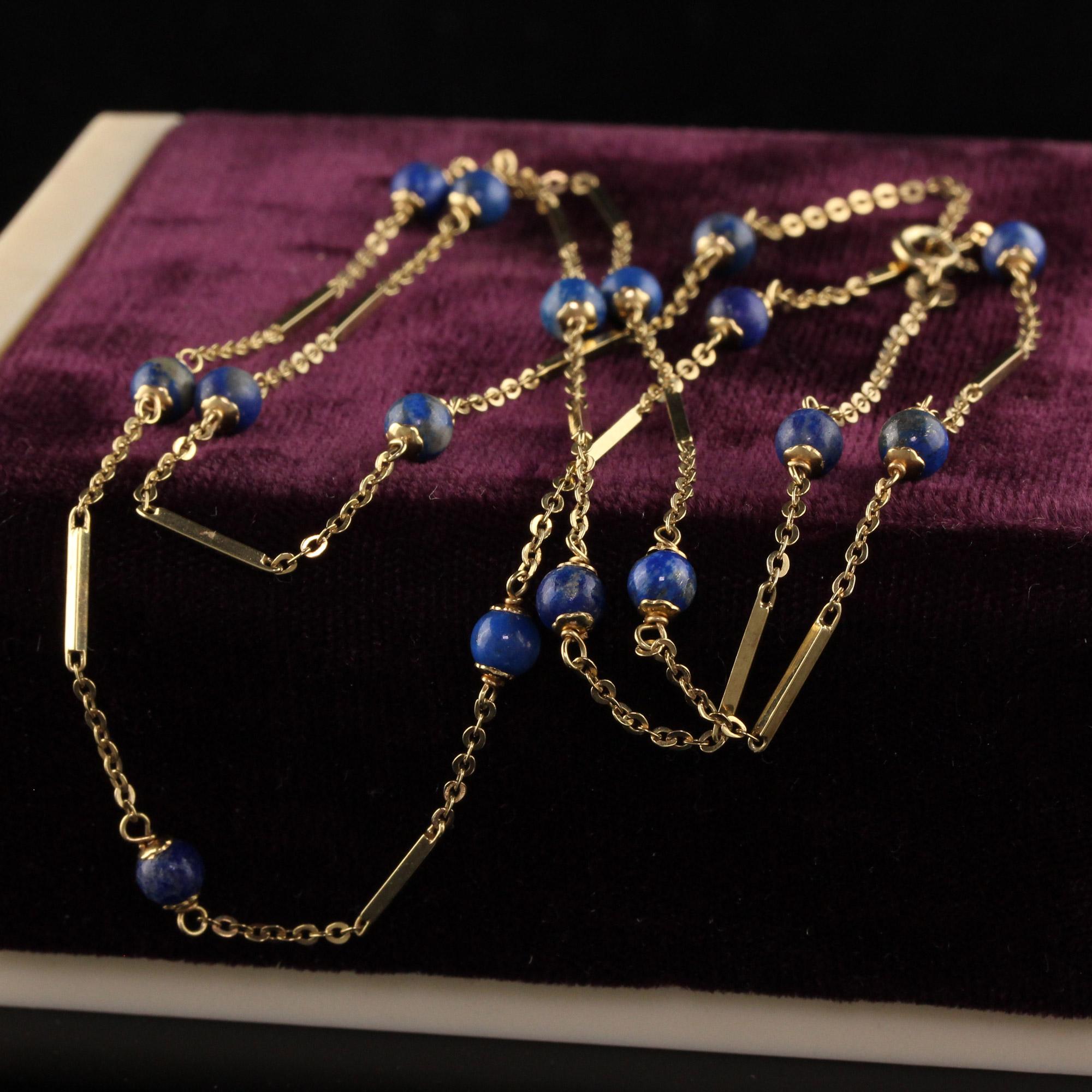 Beautiful Vintage Estate 14K Yellow Gold Lapis Bar Chain Necklace. This beautiful necklace is crafted in 14k yellow gold. The necklace has natural lapis balls on it and they are in great condition.

Item #N0090

Metal: 14K Yellow Gold

Weight: 9.2