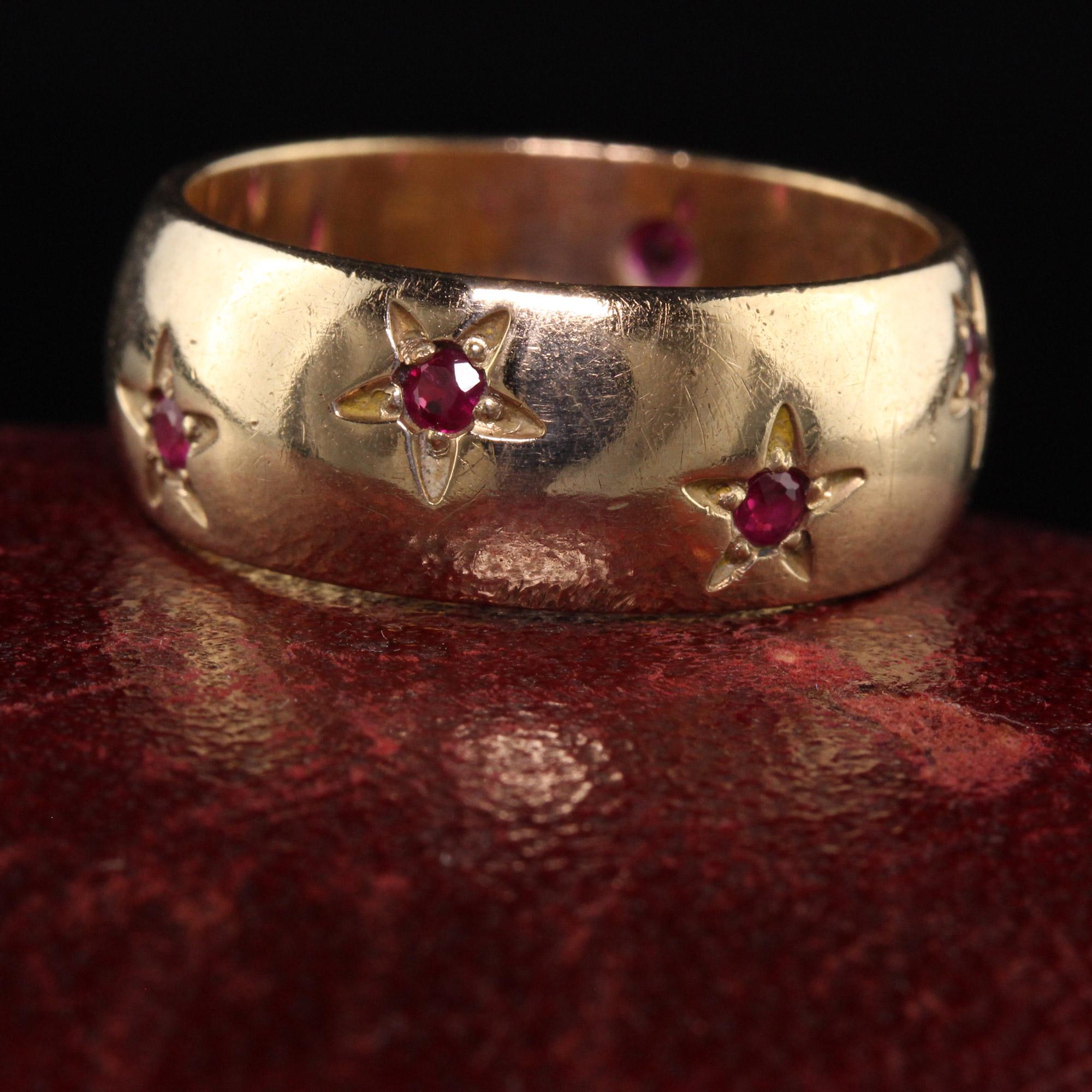 Beautiful Vintage Estate 14K Yellow Gold Ruby Star Pattern Wide Wedding Band. This beautiful wedding band is crafted in 14K yellow gold and has rubies set in a star pattern going around the entire ring. It is very unique!

Item #R1155

Metal: 14K