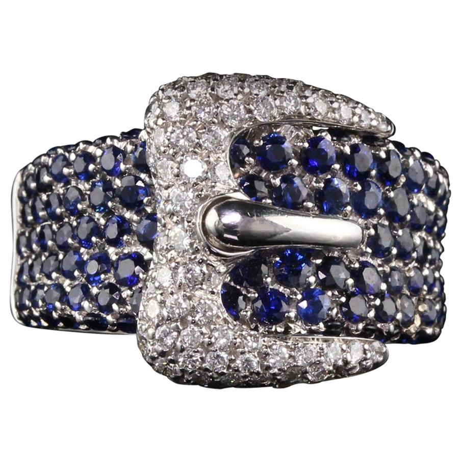 Bague boucle ancienne de succession en or blanc 18 carats avec diamants et saphirs