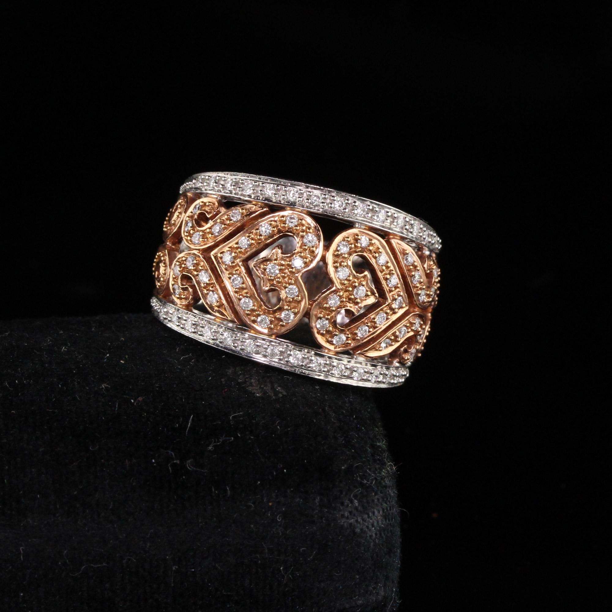 Dazzling diamonds set in elaborately designed rose and white gold ring.

Metal: 18K Rose/White Gold

Weight: 11.1 Grams

Total Diamond Weight: Approximately 0.50 ct.

Diamond Color: H

Diamond Clarity: SI1

Ring Size: 6.75 (sizable)

Measurements: