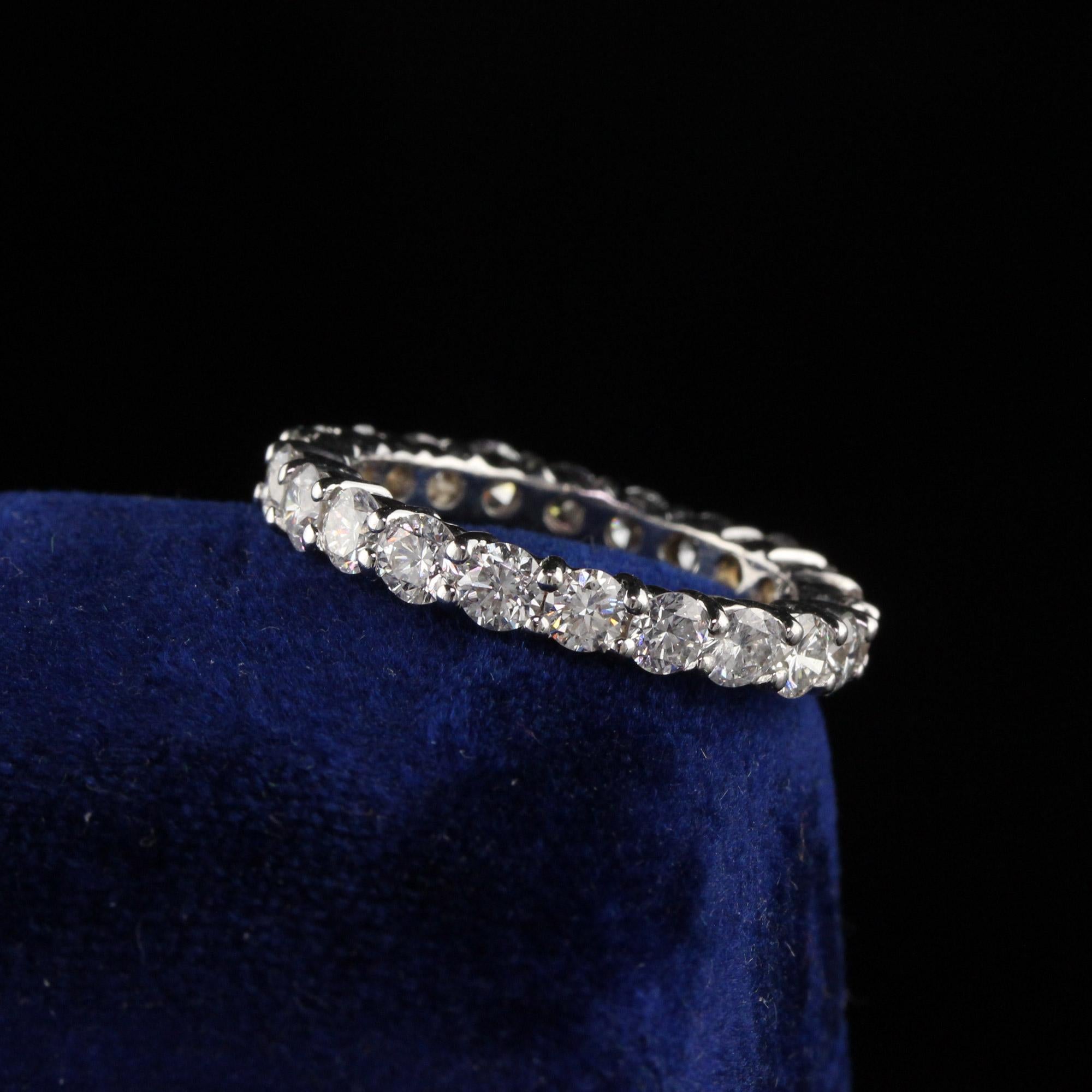 Round diamonds set in a beautiful eternity band 

Metal: White Gold

Weight: 4.3 Grams

Total Diamond Weight: Approximately 2.50 cts

Diamond Color: H

Diamond Clarity: VS2-SI1

Ring Size: 6.75

Measurements: 3.2 x 3.3 mm
