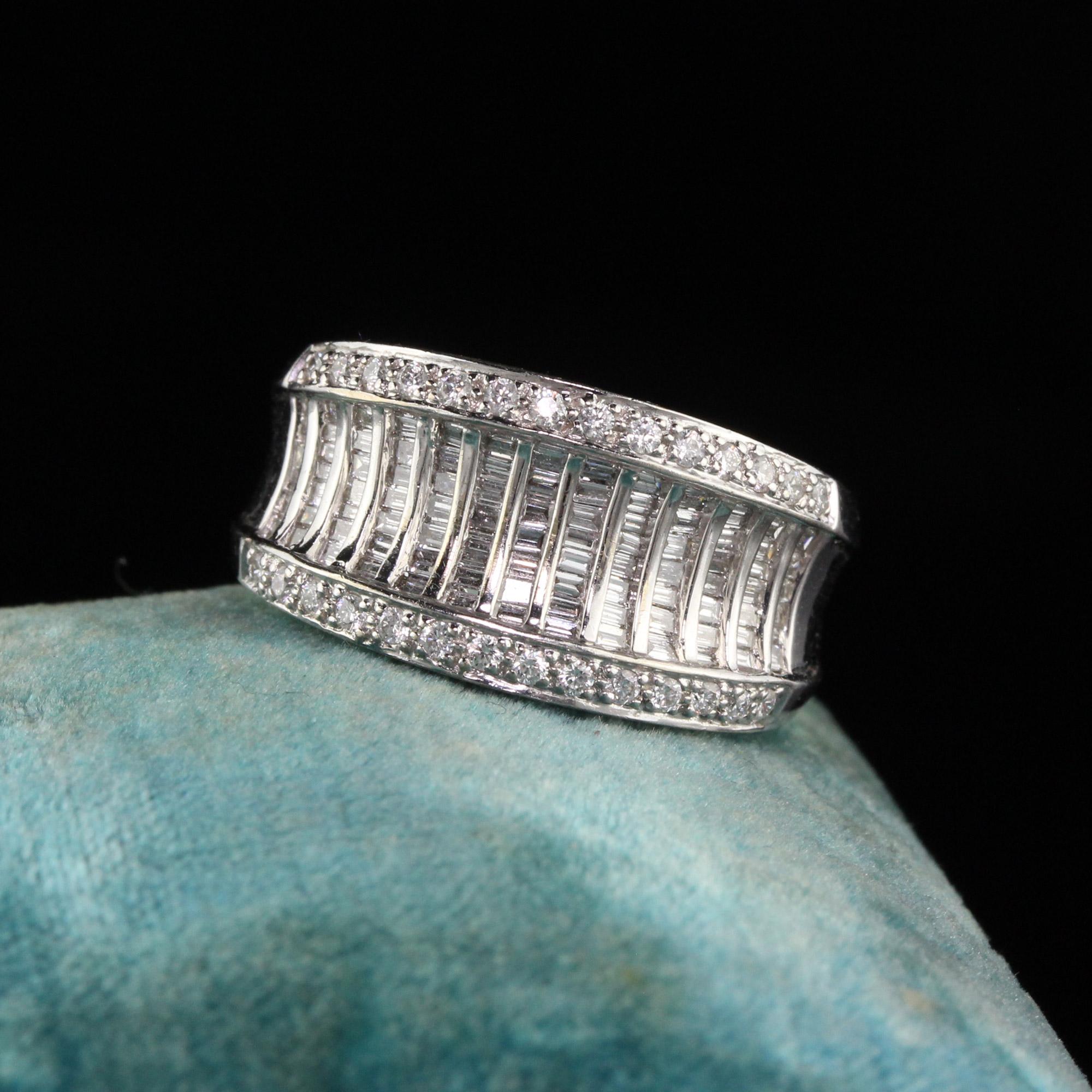 Dazzling wide gold diamond band.

Metal: 18K White Gold

Weight: 10.4 Grams

Total Diamond Weight: Approximately 1 ct.

Diamond Color: H

Diamond Clarity: SI1

Ring Size: 6.5 (sizable)

Measurements: 11.12 x 4.47 mm

