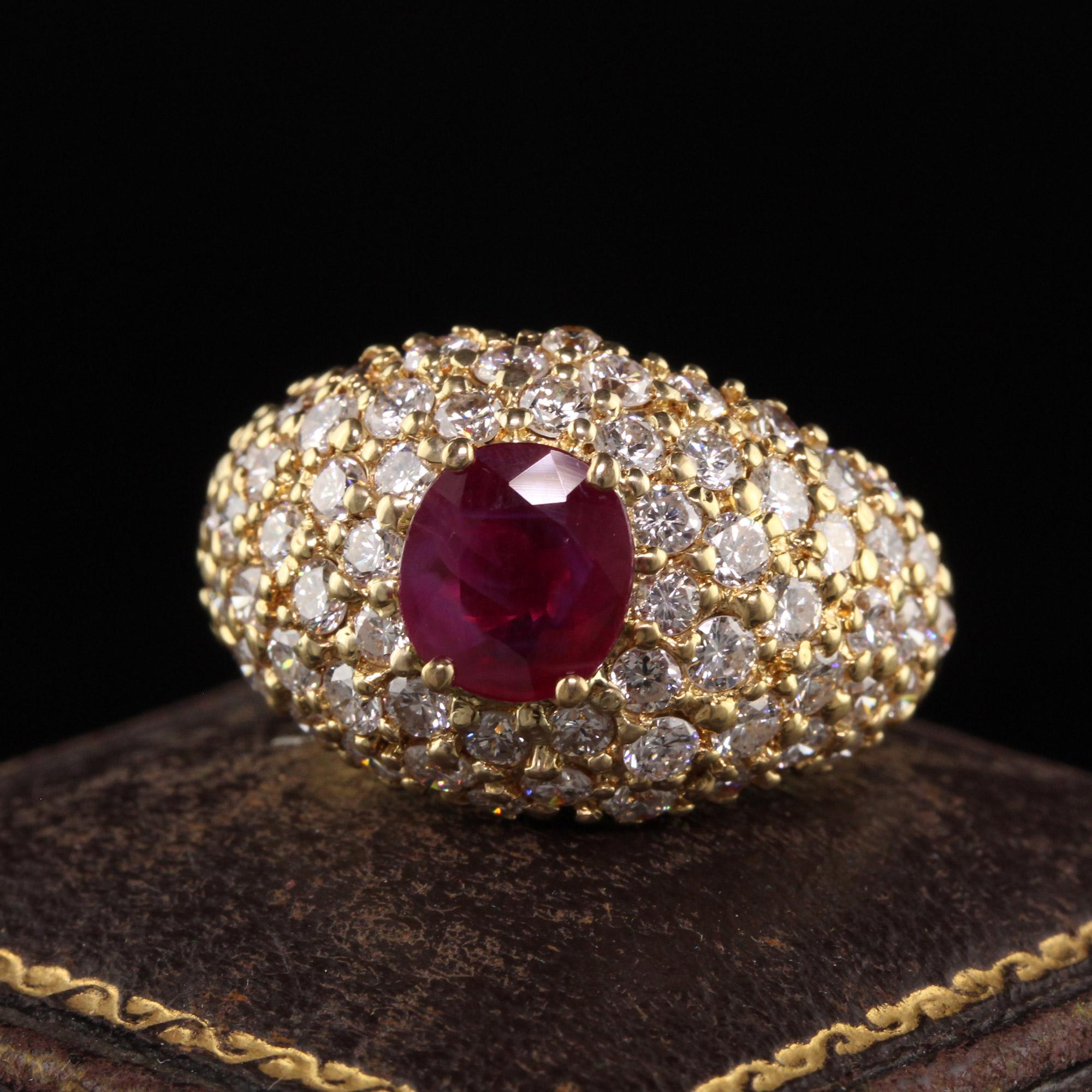 Beautiful Vintage Estate 18K Yellow Gold Burma Ruby and Diamond Ring - GIA. This beautiful ring is crafted in 18k yellow gold. The center holds a GIA certified Burma ruby with white diamonds surrounding it. It has the diamond and ruby weight