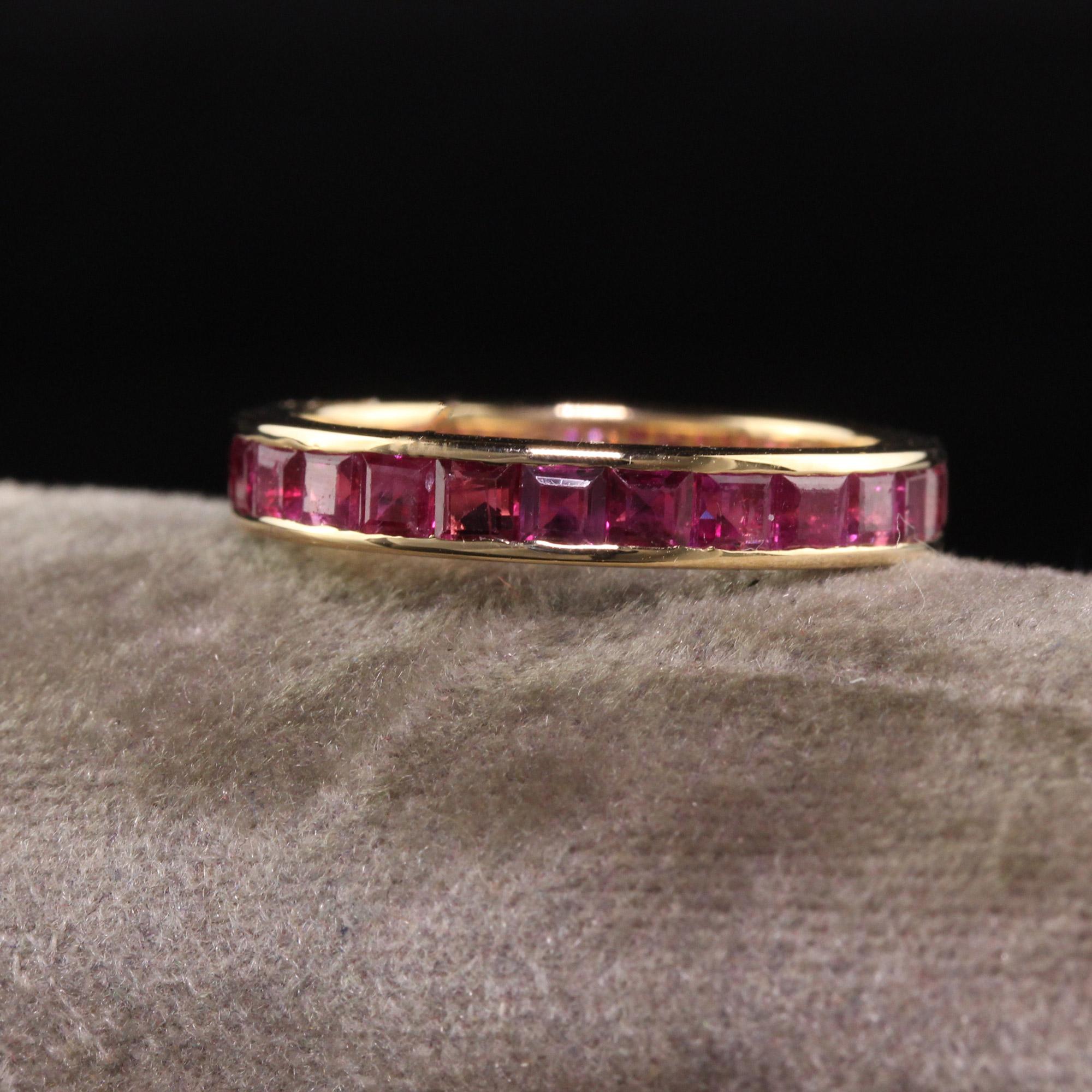 Beautiful Vintage Estate 18K Yellow Gold Square Cut Ruby Eternity Band. This beautiful band is crafted in 18k yellow gold. There are square cut nautral rubies going around the entire ring and is in good condition.

Item #R1382

Metal: 18K Yellow