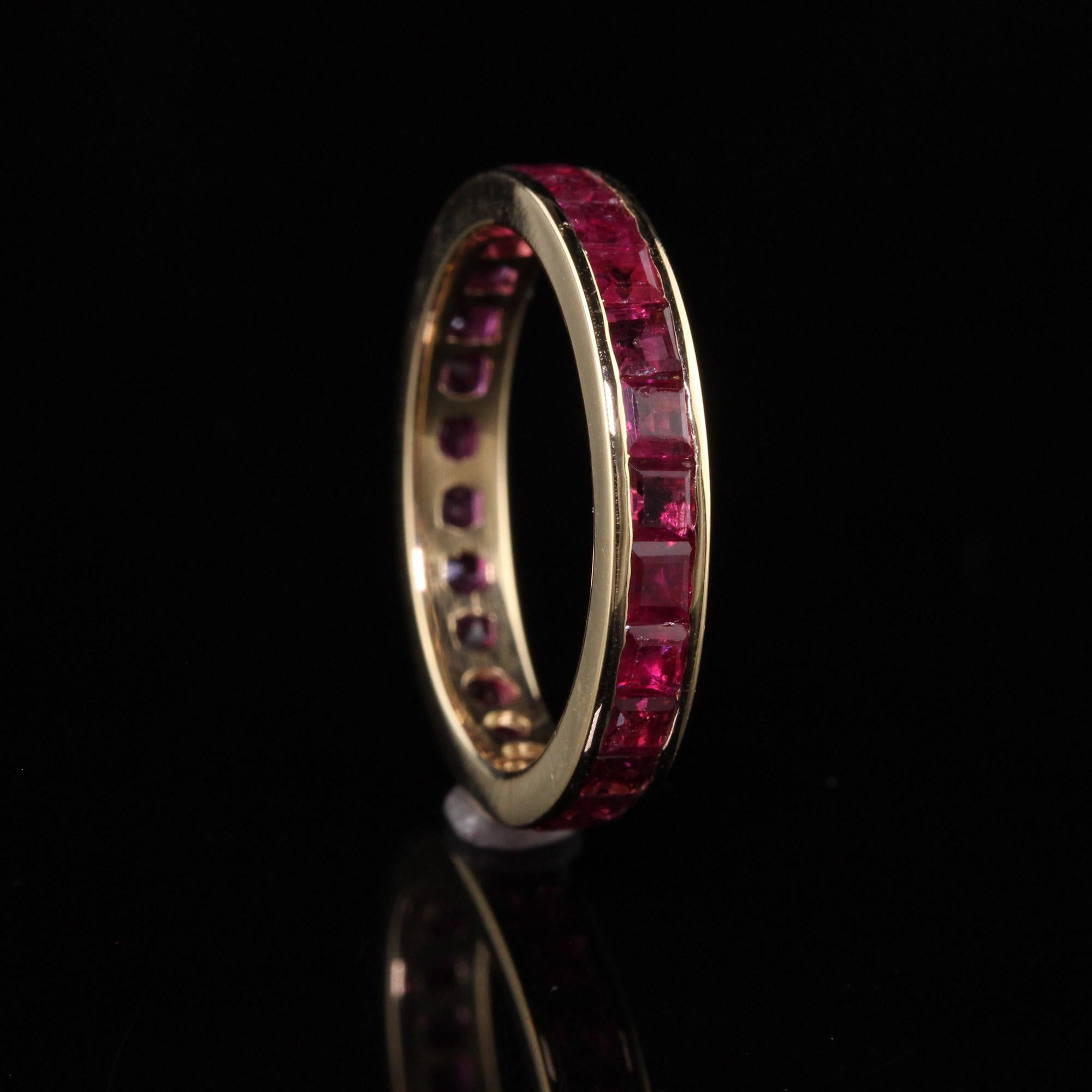 Vintage Estate 18K Yellow Gold Square Cut Ruby Eternity Band In Good Condition In Great Neck, NY