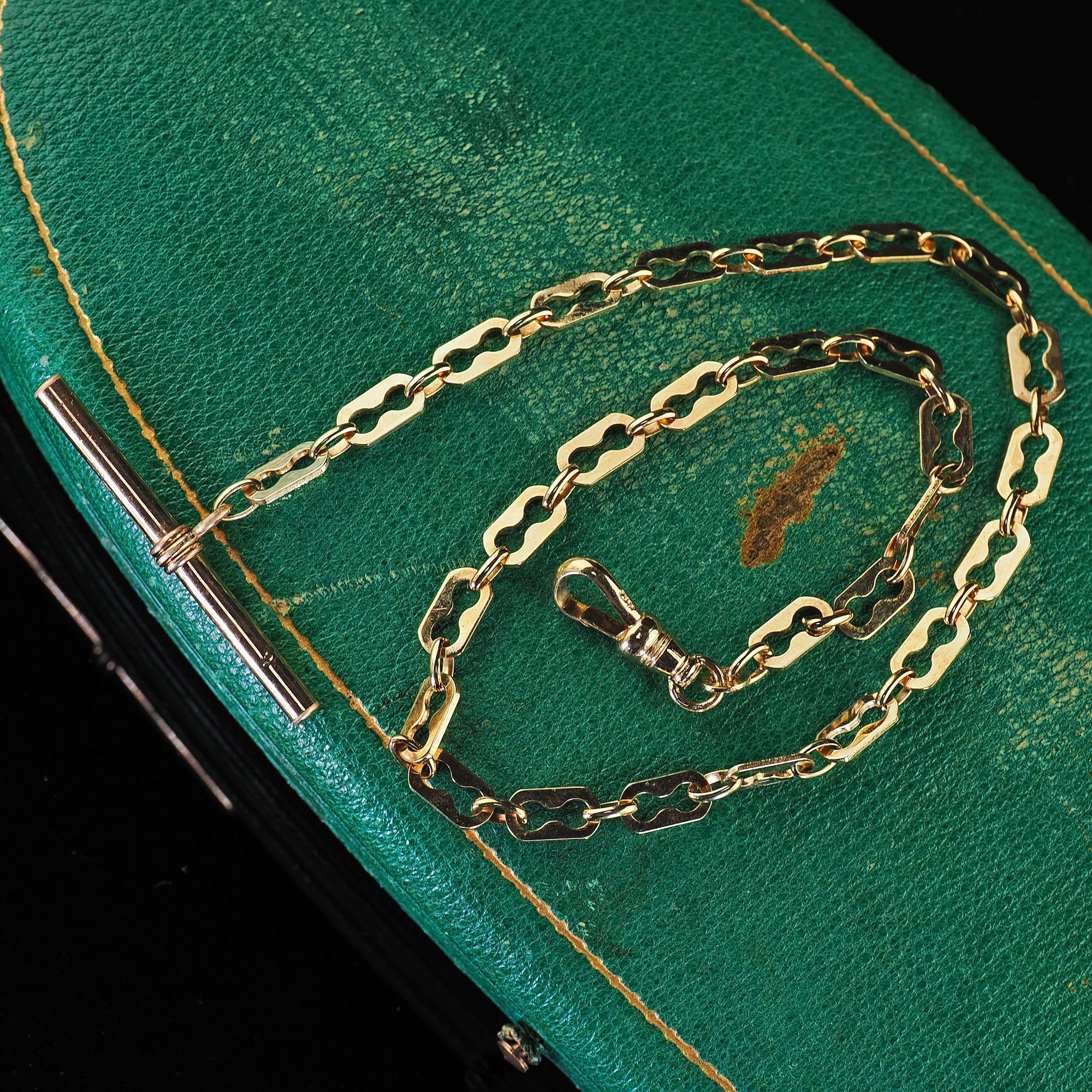 Beautiful Vintage Estate 18K Yellow Gold Watch Fob Chain Link - 13 inches. This gorgeous vintage watch fob chain is crafted in 18k yellow gold with a 14k yellow gold T bar and lock. This chain features an 18k yellow gold chain with a beautiful link