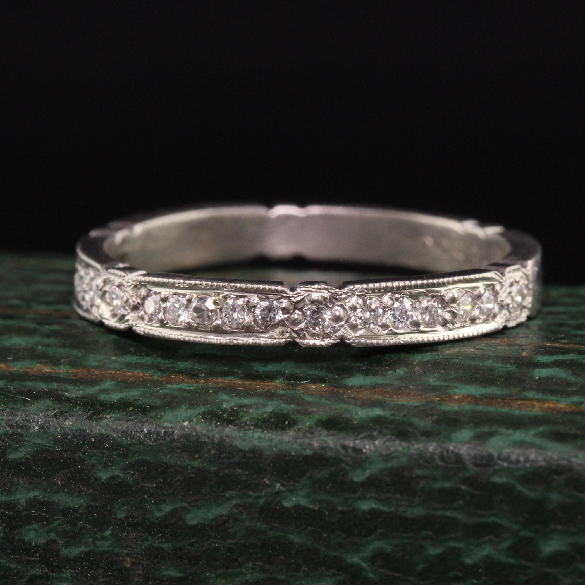 Beautiful Vintage Estate Palladium Round Diamond Engraved Wedding Band. This beautiful wedding band has round diamonds set across the top of a vintage palladium band.

Item #R1084

Metal: Palladium

Weight: 2.3 Grams

Size: 6 3/4

Diamonds: .15