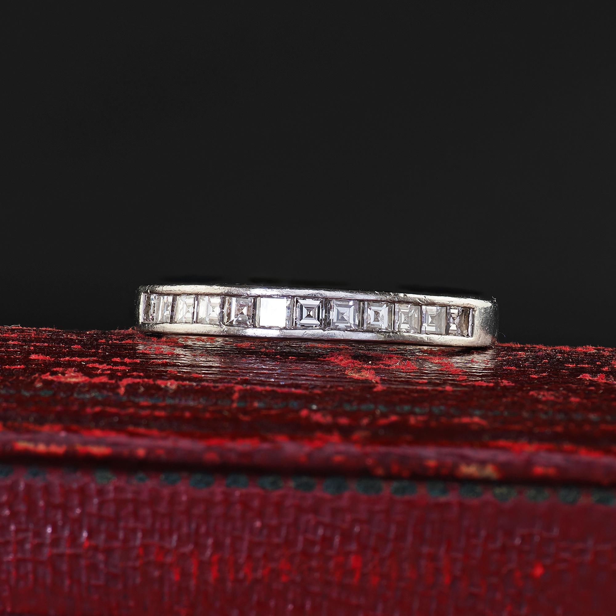 Beautiful Vintage Estate Platinum Carre Cut Diamond Half Eternity Band Ring - Size 5 1/2. This beautiful vintage estate carre cut diamond band ring is crafted in platinum. The ring features carre cut diamonds set on top of a vintage platinum band.