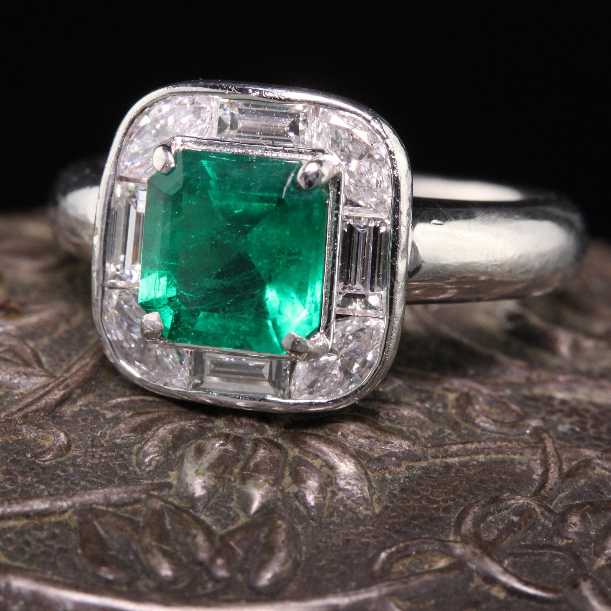 Amazing ring circa 1950's featuring a GIA certified Colombian Emerald set in a vintage platinum mounting with alternating baguette and marquise cut diamonds.

#R0273

Metal: Platinum

Weight: 8.1 Grams

Center Stone: 1.11 ct Colombian Emerald (GIA