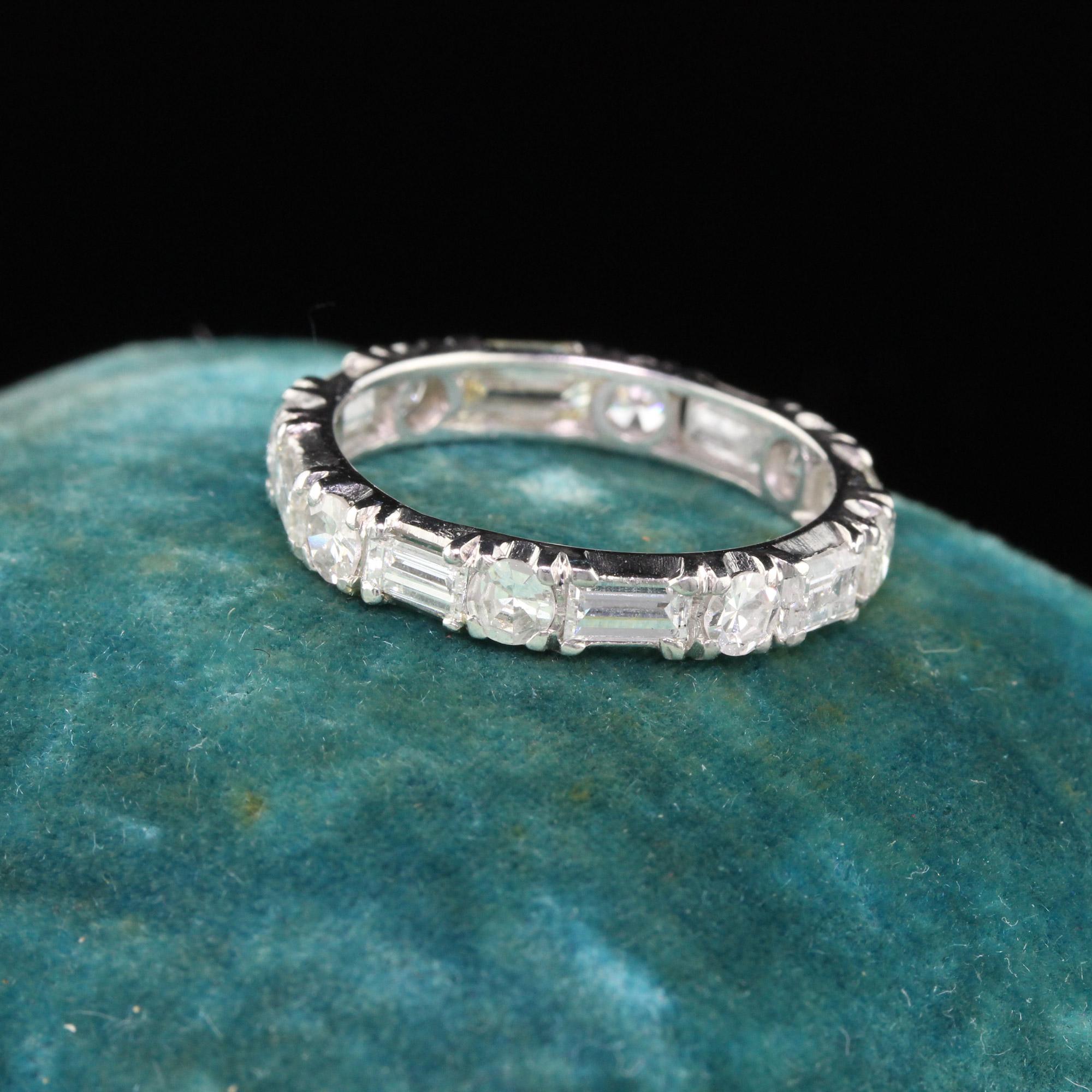Vintage Platinum eternity band with alternating baguette cut & single cut diamonds.

#R0251

Metal: Platinum

Weight: 3.7 Grams

Total Diamond Weight: Approximately 3.30 ctw

Diamond Color: I-M

Diamond Clarity: SI2-I2

Ring Size: 7