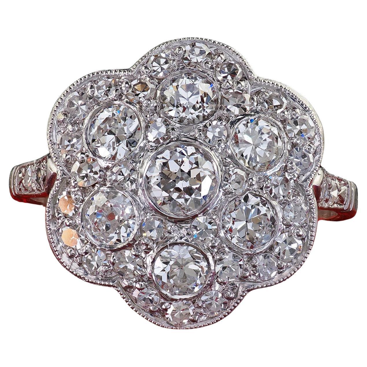 Anello da cocktail in platino d'epoca con diamante taglio europeo inciso e floreale