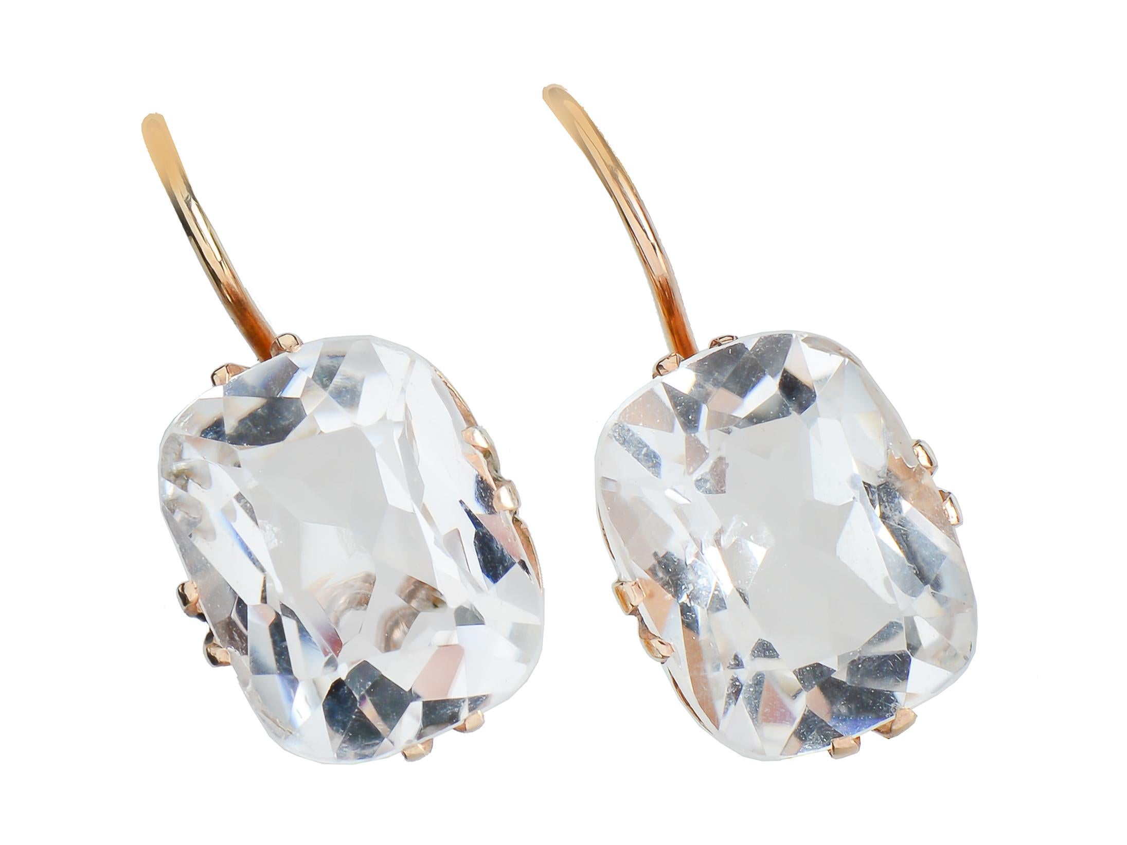 Brilliant 8 Ct. rock crystal earrings, set in 14 Kt gold over, dress up an outfit whether it be denim or evening wear. The crystal is cool, pure and gives a lift to one's spirit. Many sense that crystal has healing and calming properties. The
