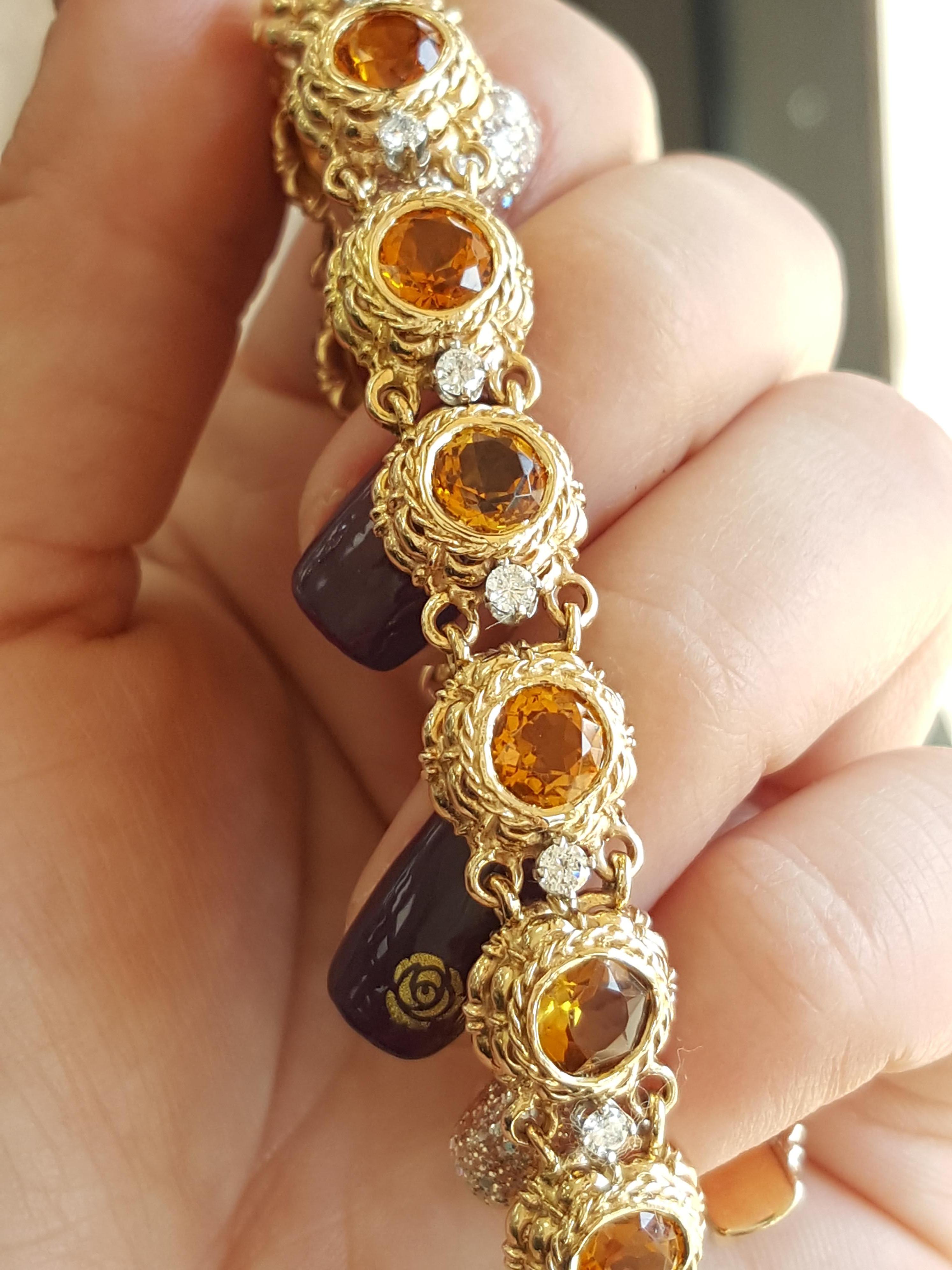 Vintage citrine ⋄ bracelet is absolutely striking dating back to the 1960's.  The piece is in excellent condition perfect as a statement bracelet and layering bracelet!

Metal: 14K Yellow  Gold
Center Stone: Orange Citrine
Citrine Weight: