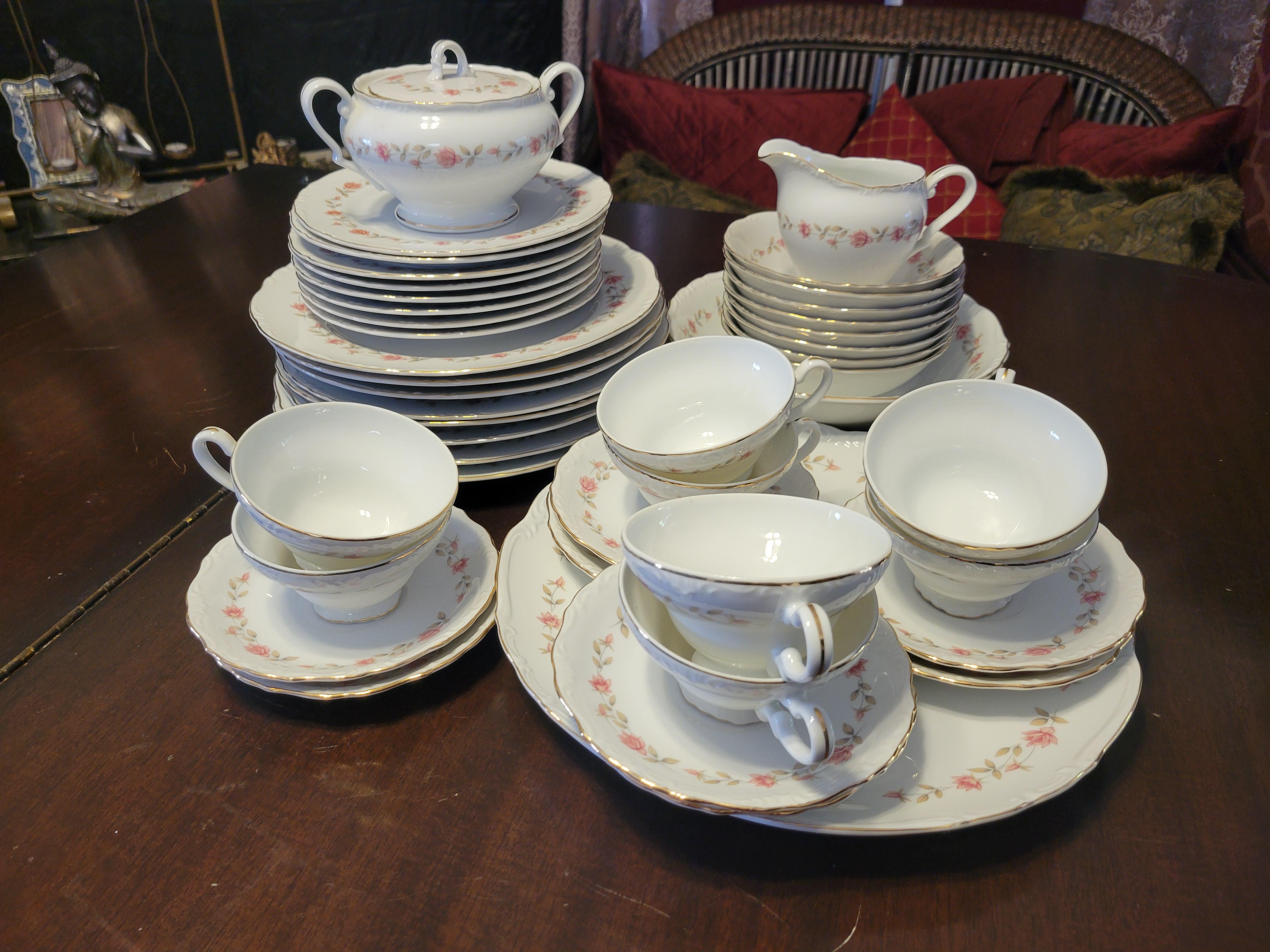 Vintage, Eternal Rose dining set. Made is Japan. 
The set consists of:
8 tea cups, 
8 saucers, 
8 snack plates - 7.5