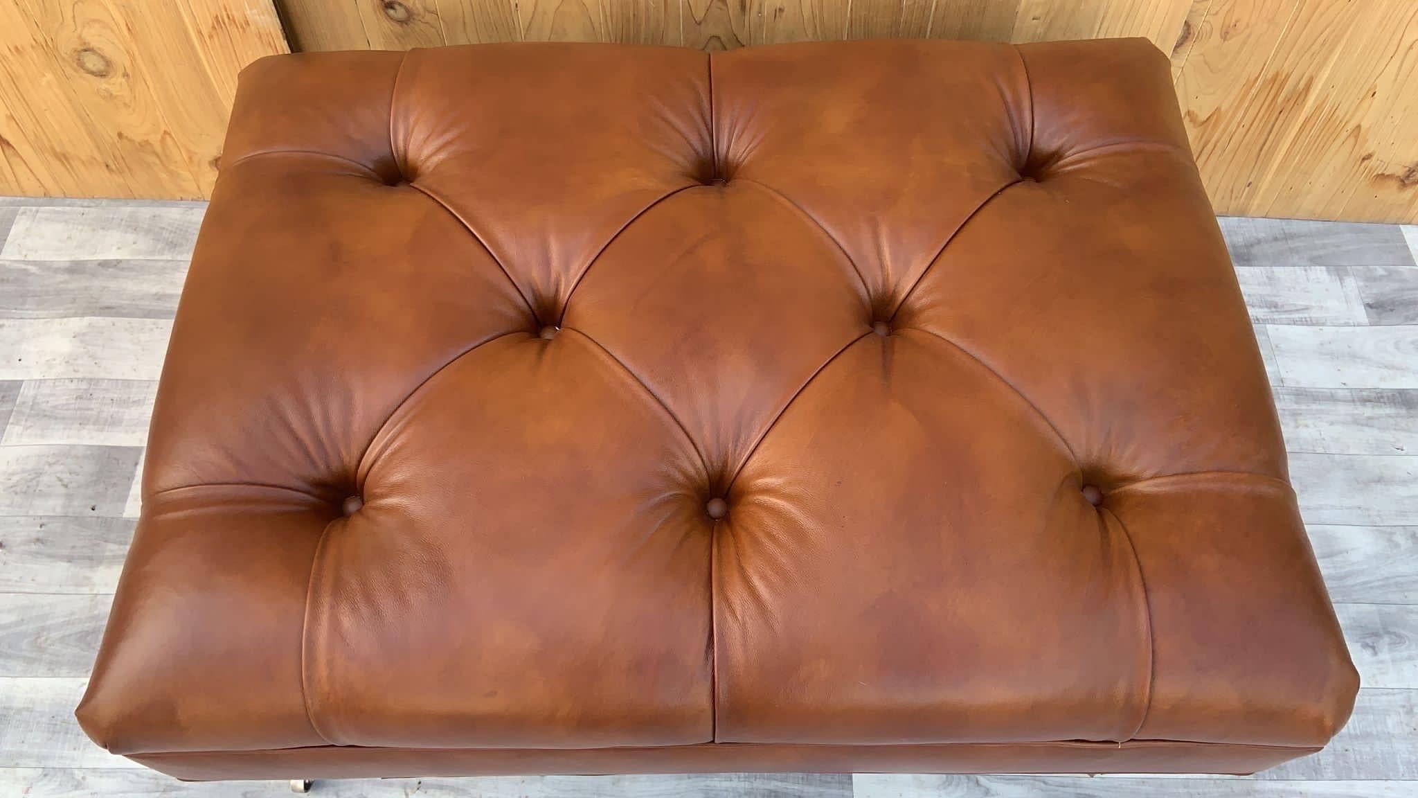 Vintage Chesterfield Style Leather Tufted Ottoman

Gorgeous vintage English Chesterfield style leather tufted ottoman. Can also be used as a coffee table. This beautiful piece has been newly upholstered in a high end, soft, full grain, Whiskey