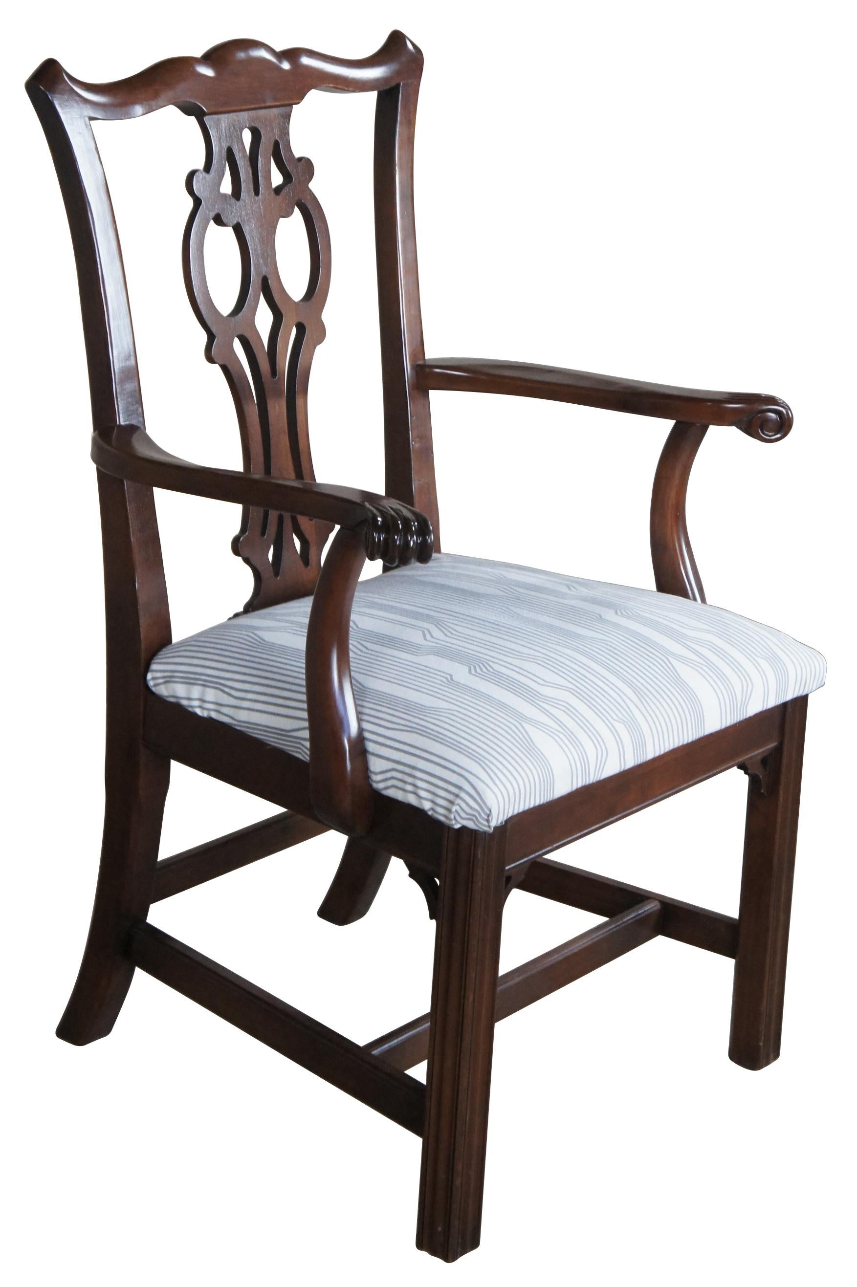 Ethan Allen Splat Back Chippendale chair, 11-6060A. Part of the Georgian Court Collection. Made from cherry with a serpentine crest rail over pierced splat back and contoured arms. The chair is supported by straight legs with fluted accents. Seat is