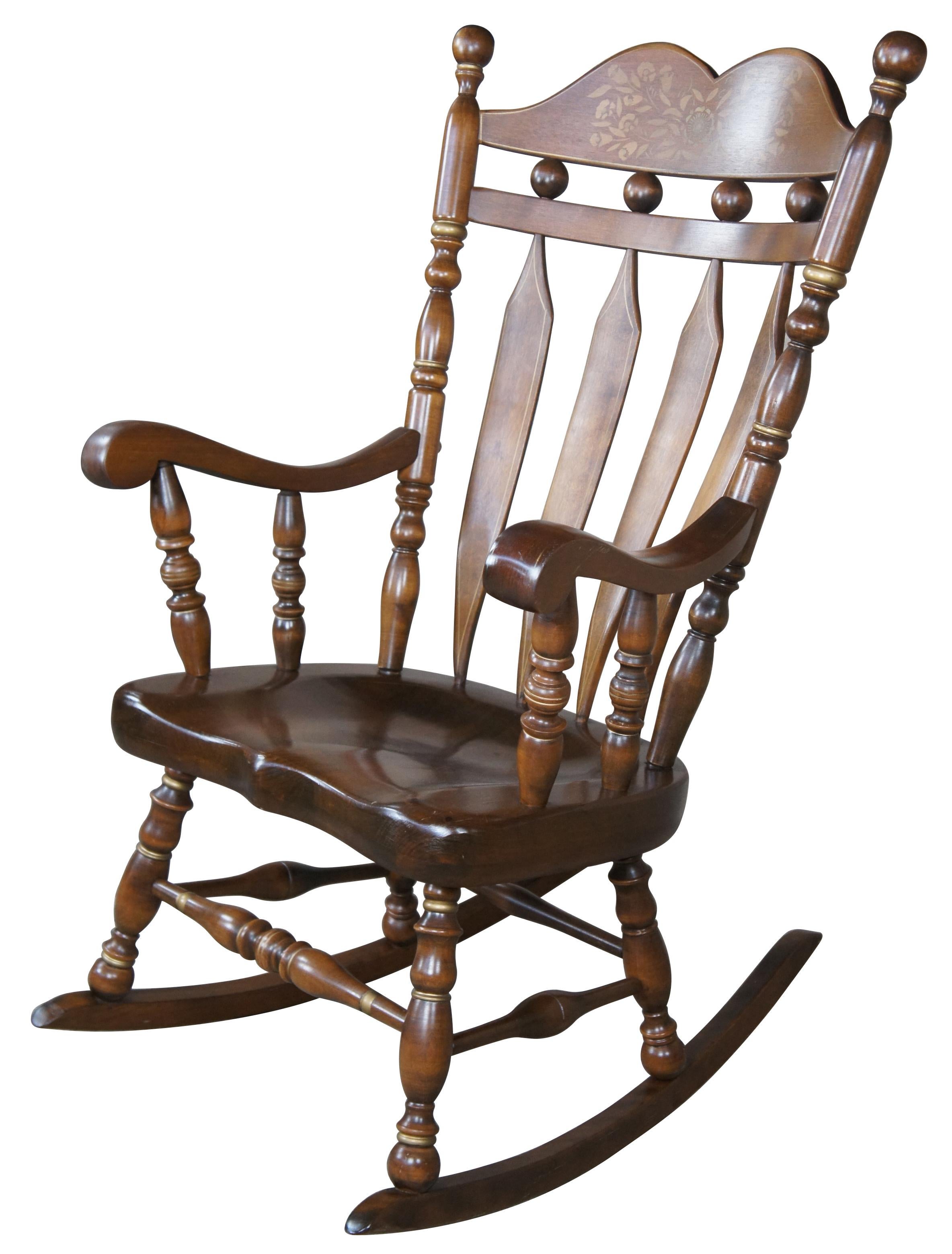 Vintage Ethan Allen Antique Old Tavern Pine Decorated Rocker No 12-9019, Circa 1971. Made from maple and pine with a deep saddled seat and stenciled floral back. Reminiscent of Hitchcock styling.