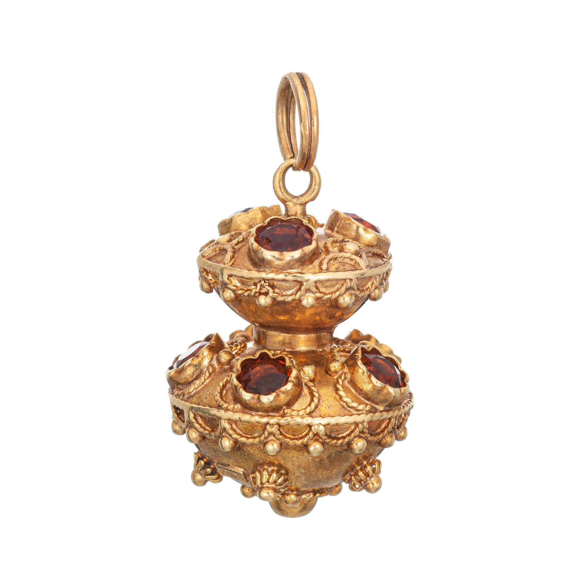 Finely detailed vintage Etruscan style citrine charm crafted in 18k yellow gold.  

8 citrines are estimated at 0.20 carats each and total an estimated 1.60 carats. The citrines are in excellent condition and free of cracks or chips. 

The ornate