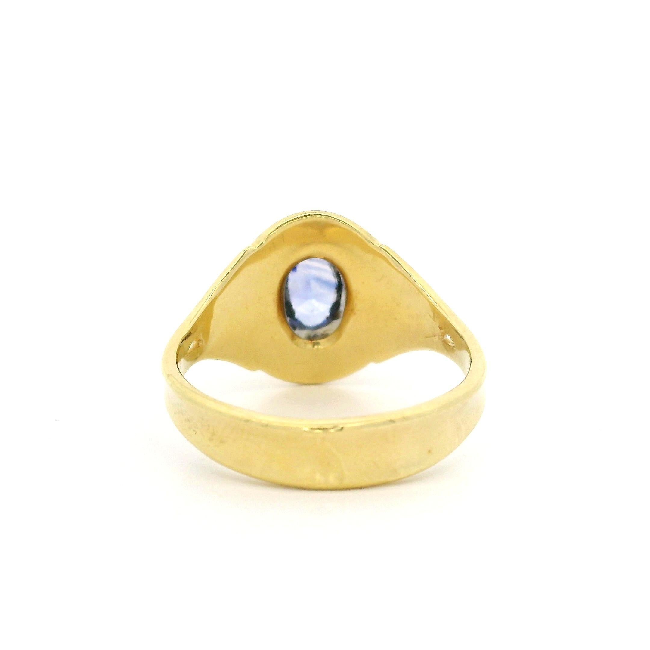 --Stone(s):--
(1) Natural Genuine Sapphire- Oval Cut - Bezel Set - Clean Nice Blue Color - 7x5mm - 1.05ct (approx.)

Material: Solid 18k Yellow Gold
Weight: 6.21 Grams
Ring Size: 9.5 (We can custom size this ring. Please contact us prior to purchase