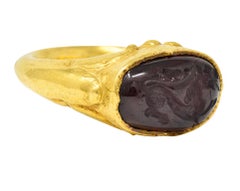 Vintage Etruscan Revival Garnet Intaglio 22 Karat Yellow Gold Lion Signet Ring