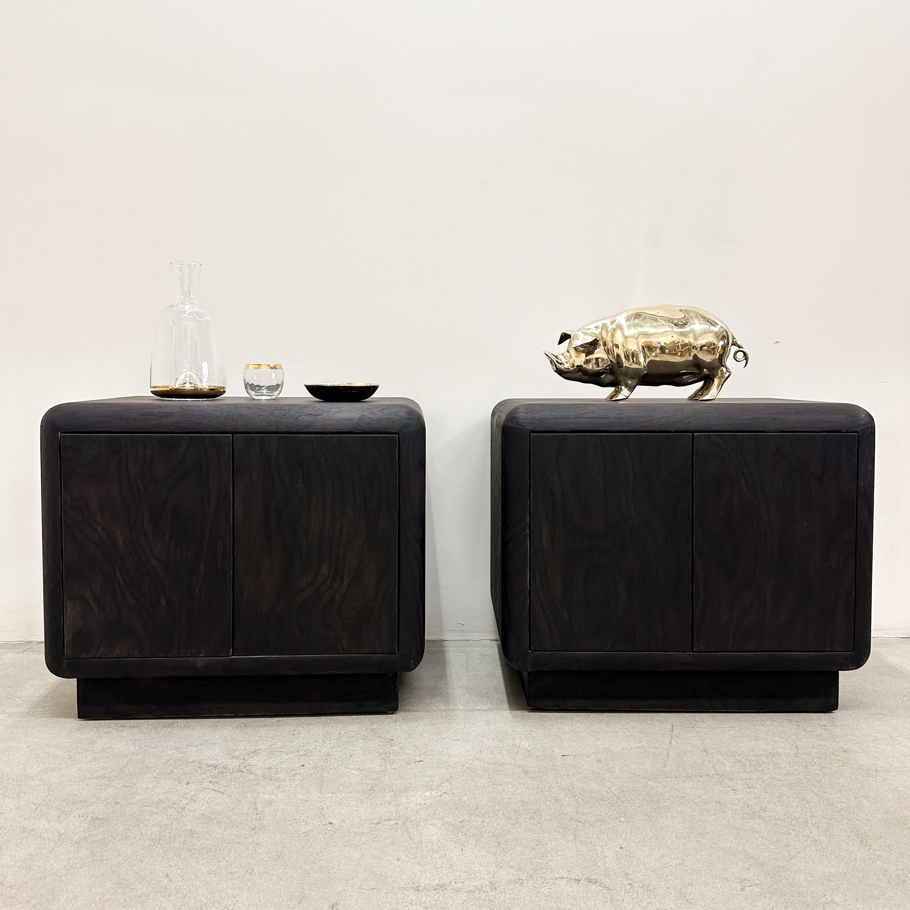 This pair of vintage Mid-Century Modern nightstands showcases a sleek, minimalist design with a rich dark brown finish, making them a perfect fit for MCM and contemporary interiors. Their clean lines and versatile proportions allow them to function
