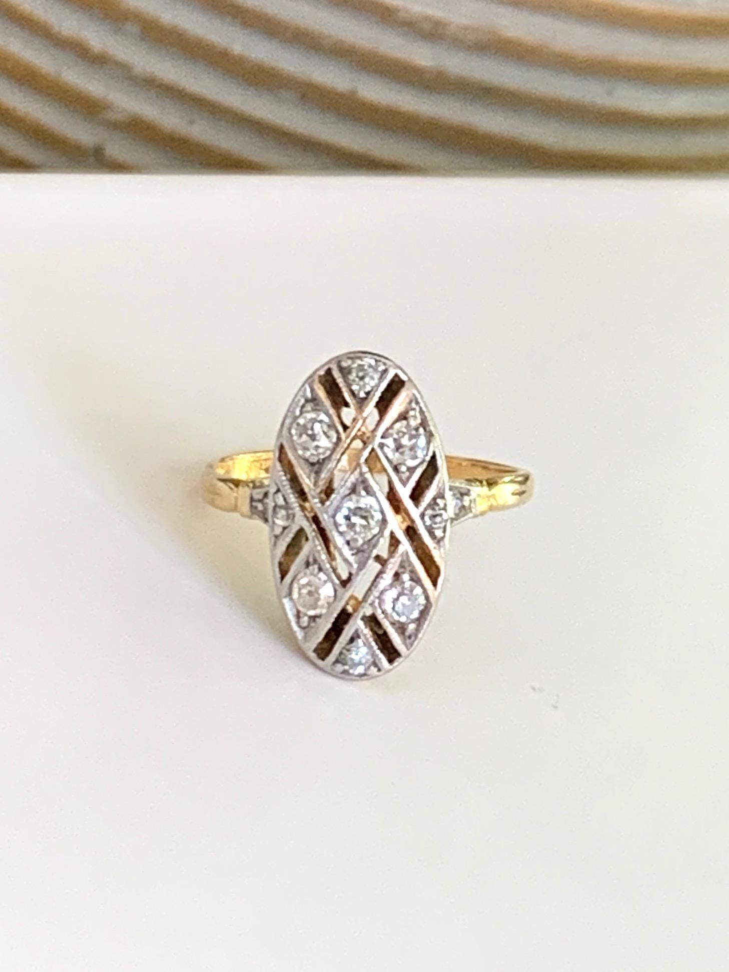 This vintage ring is stunning with the open weave-work around each of the 11 Euro cut Diamonds.  The Diamonds total approximately .30ctw with an average grade of SI-H.

Size: 5 - this ring is resizable but G. Lindberg Jewels does not provide sizing