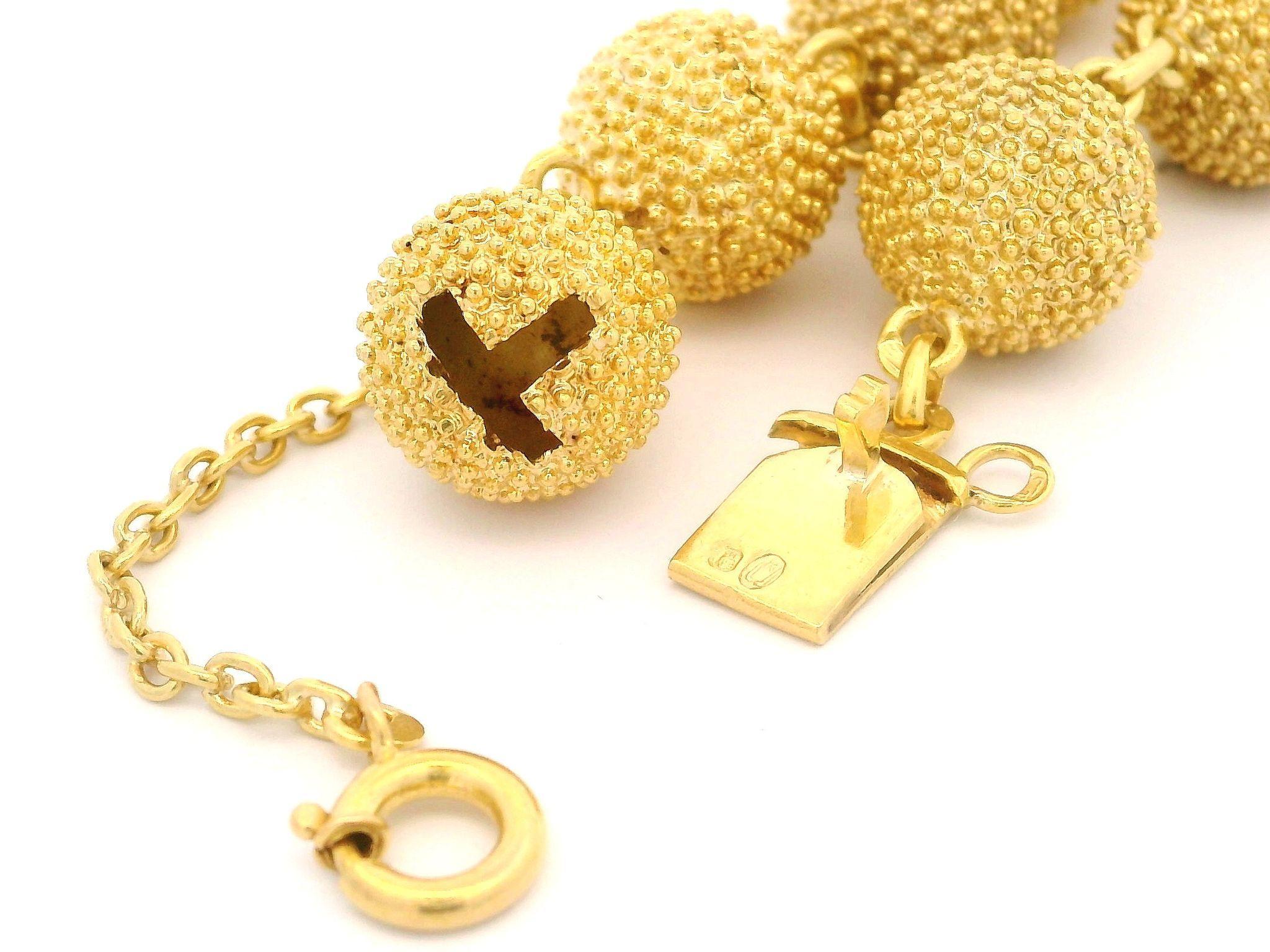 Material: Solid 18k Yellow Gold European
Weight: 28.21 Grams
Type: Textured Bead Ball Bracelet
Length: Measure 7.25