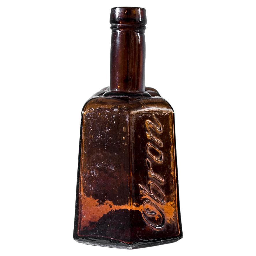 Vintage European Amber Glass Bottle For Sale